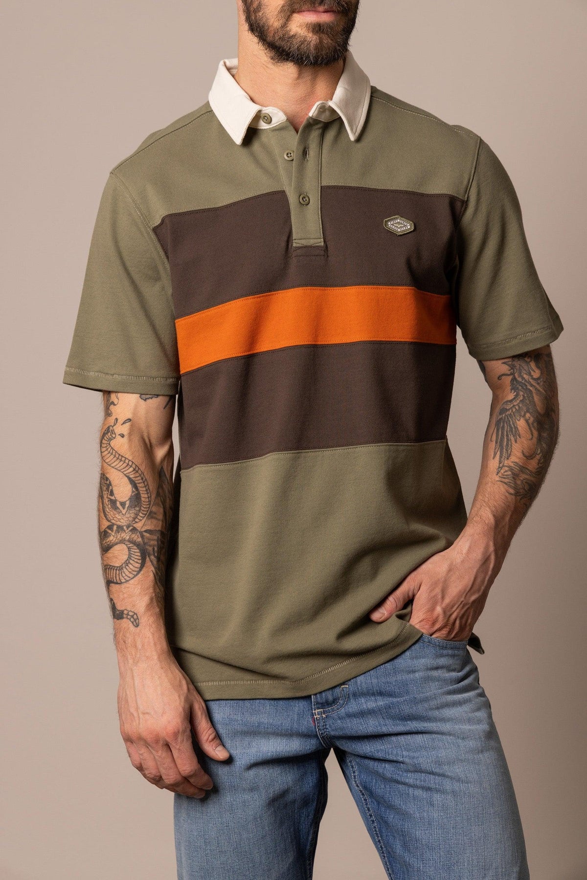 Kimes Ranch 1874 Polo in Army Green with brown and orange horizontal stripes and a cream collar