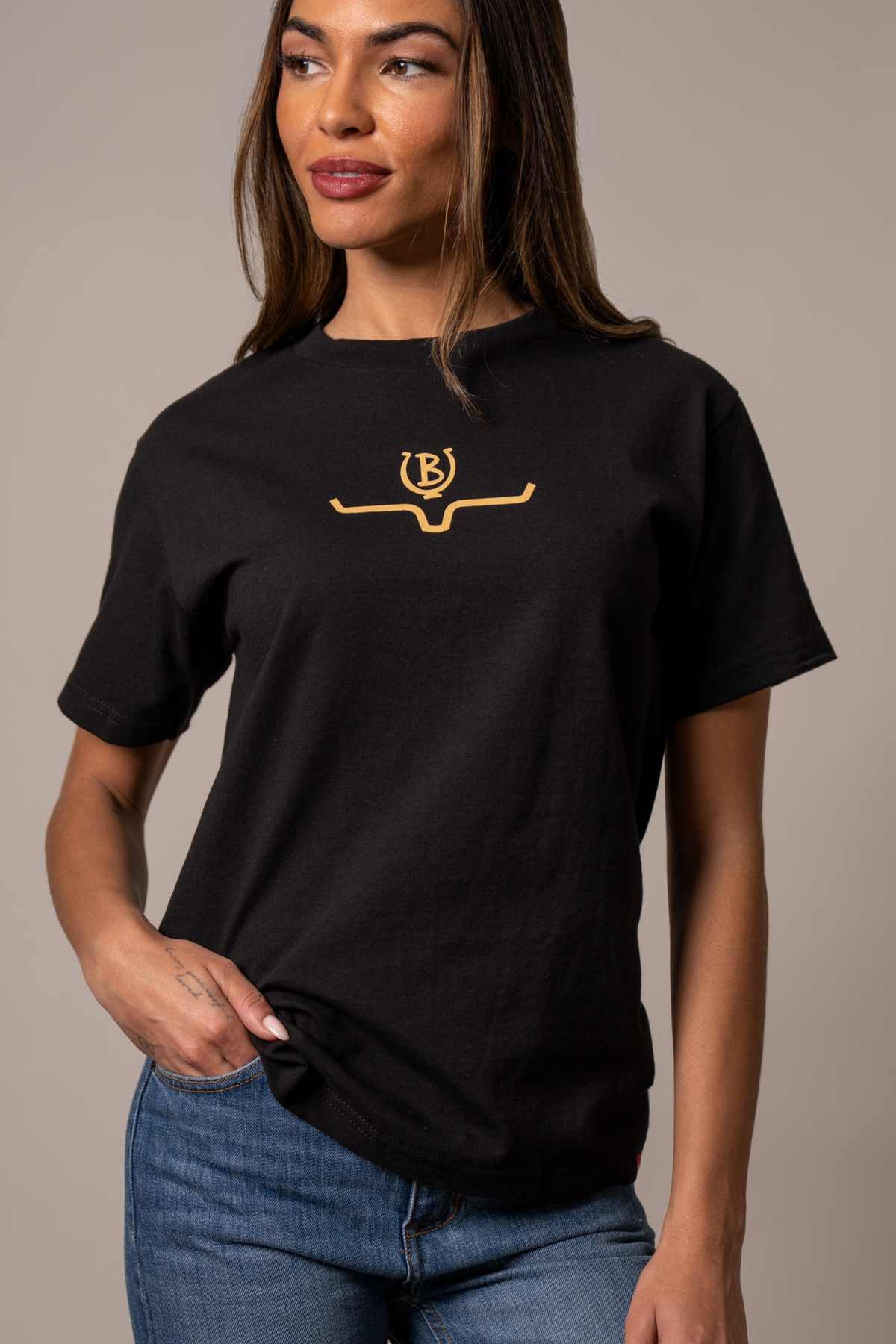 Kimes Ranch Lucky B Saddle shirt in Black with a gold Kimes Ranch logo on the chest