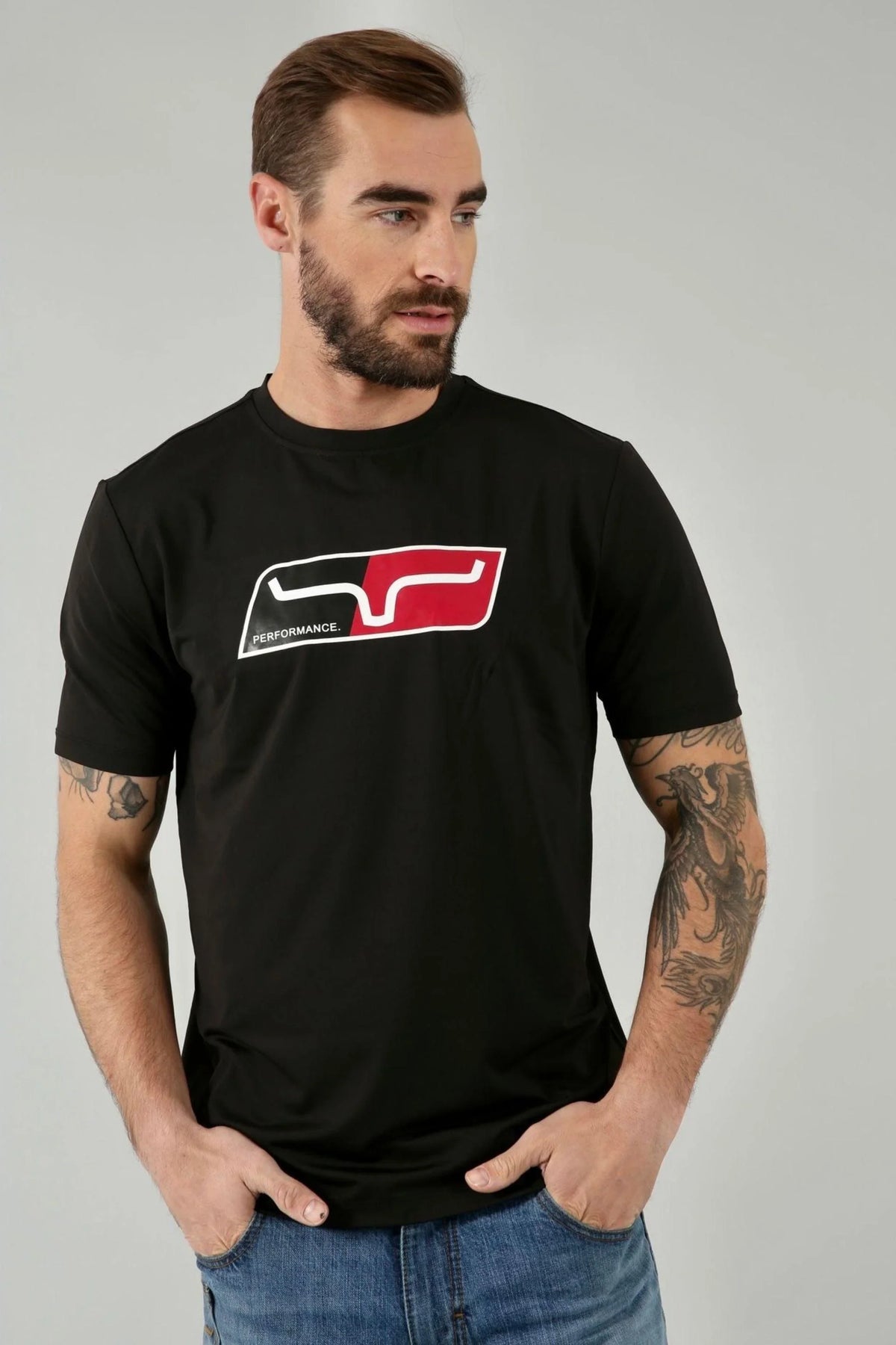 Kimes Ranch Alta Tech Tee Shirt in Black with a red and white Performance graphic on the chest