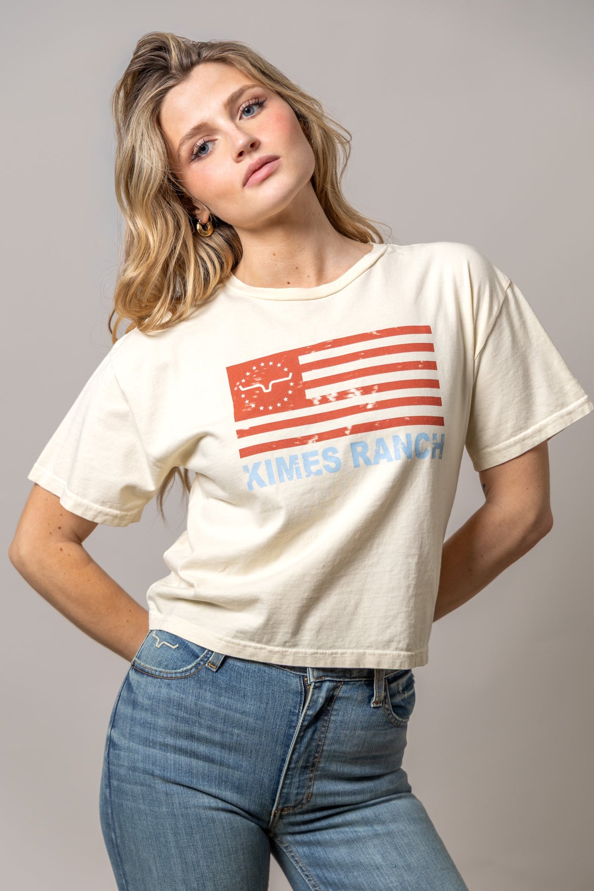 Kimes Ranch 76 shirt in Ivory with a distressed American flag graphic and Kimes Ranch logo