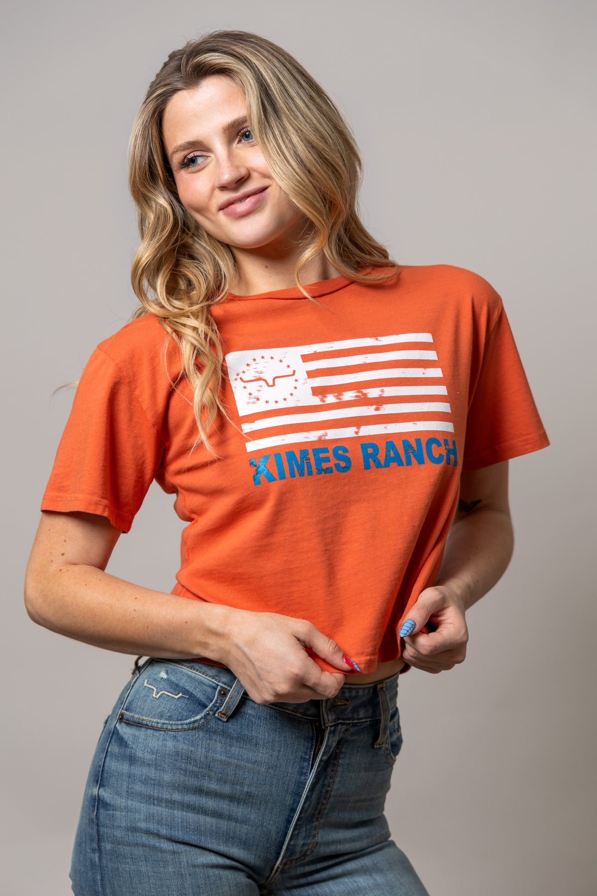 Kimes Ranch 76 Spice Red short sleeve shirt with a distressed flag graphic and Kimes Ranch logo