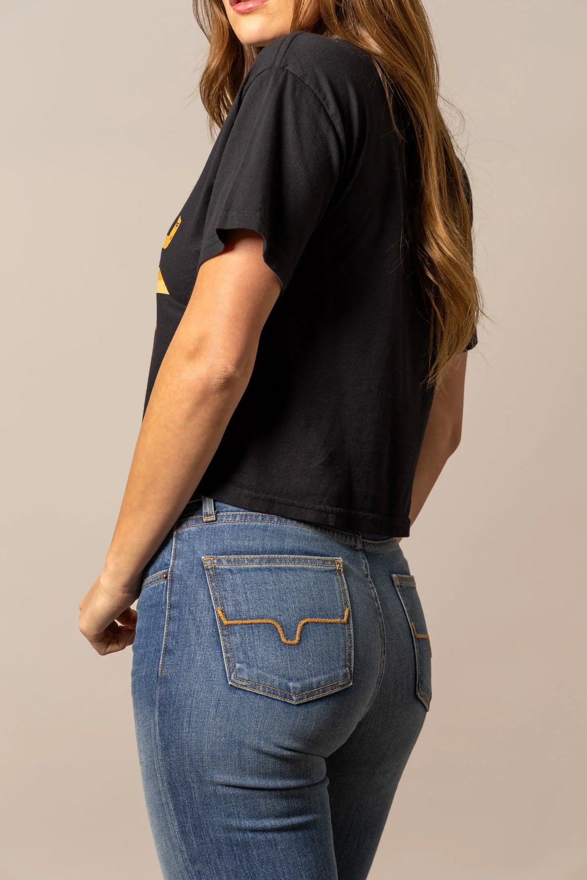 Kimes Ranch Abiquiu, side view, Black shirt with the short sleeve and relaxed fit