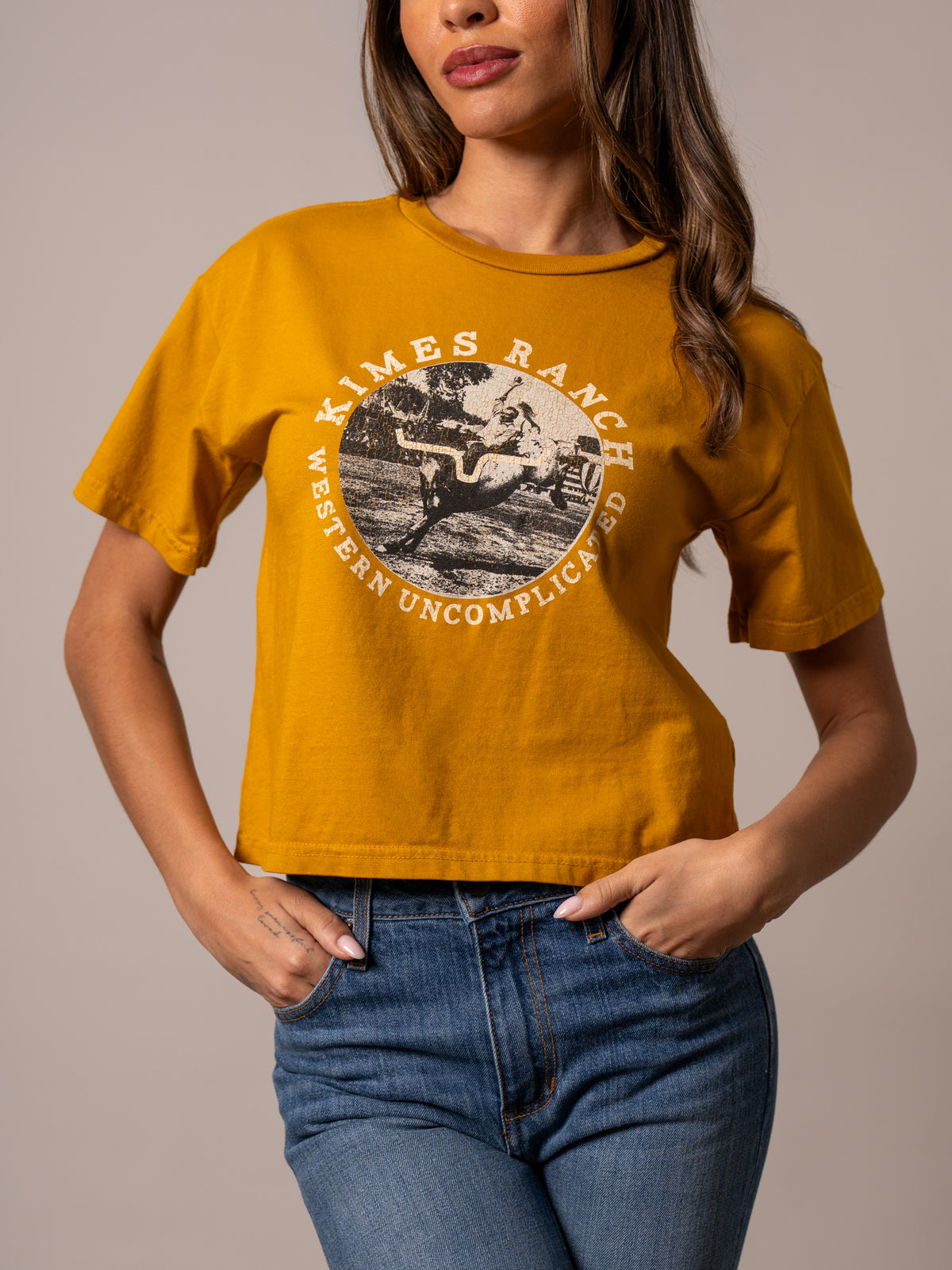 Kimes Ranch Afternoon Rodeo shirt in Gold with a vintage rodeo graphic and Western Uncomplicated text