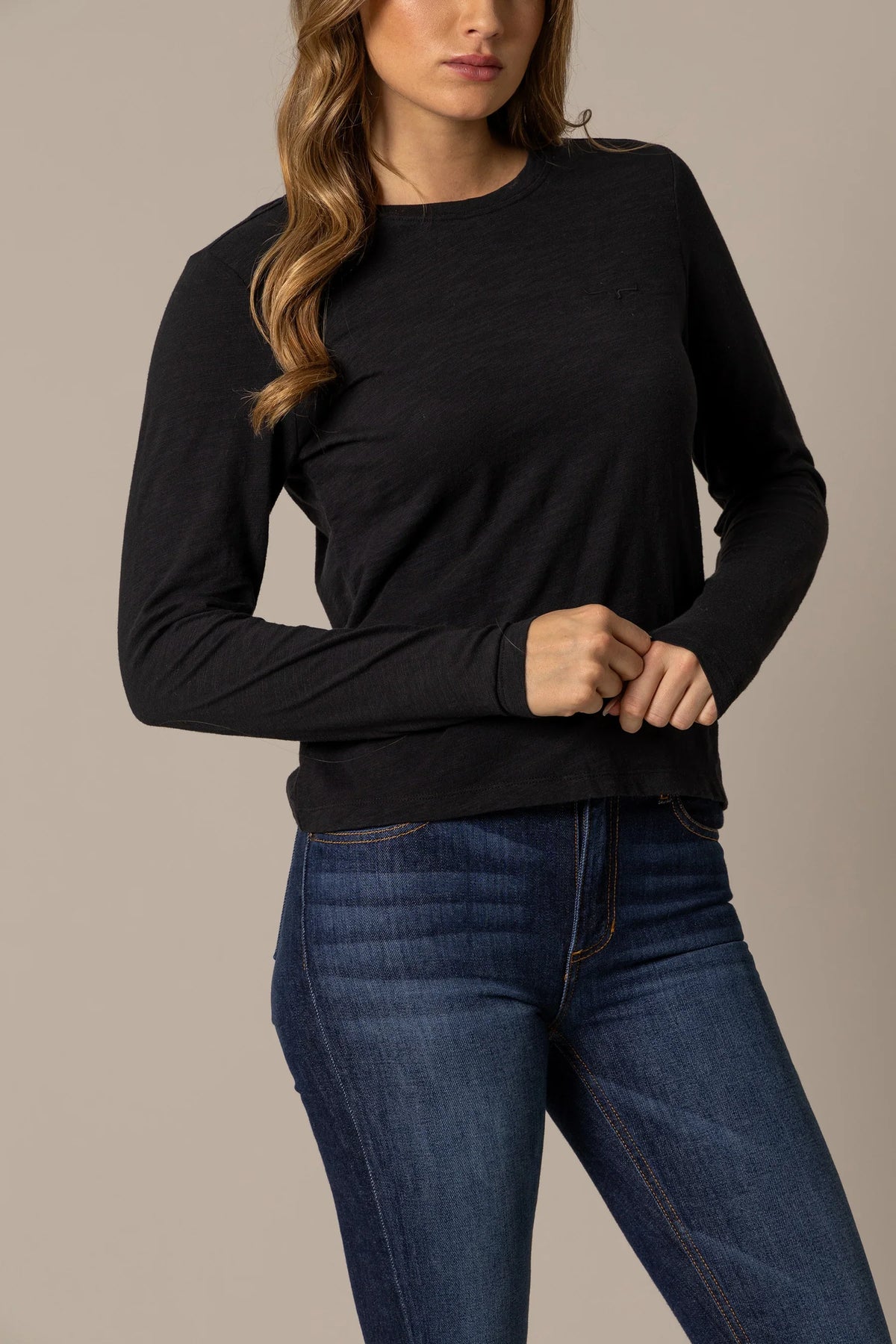 Kimes Ranch Ainsley long sleeve top in Black with a crew neck and small chest logo