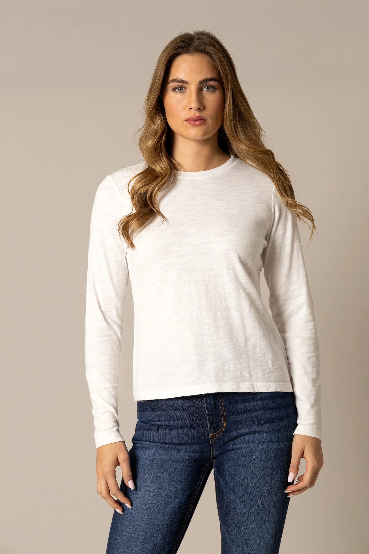 Kimes Ranch Ainsley long sleeve top in Pristine with a crewneck and embroidered logo