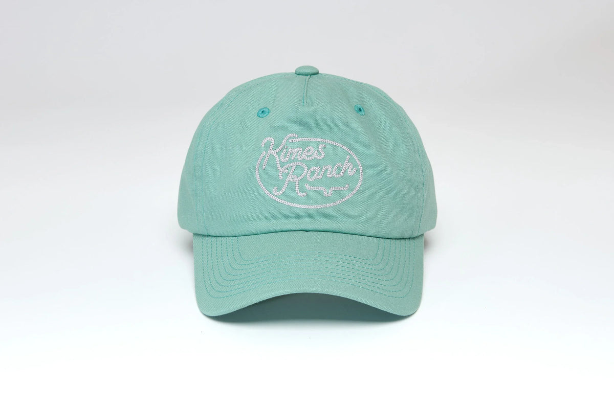 Kimes Ranch Alden hat in Grey Sage with the Kimes Ranch logo embroidered on the front