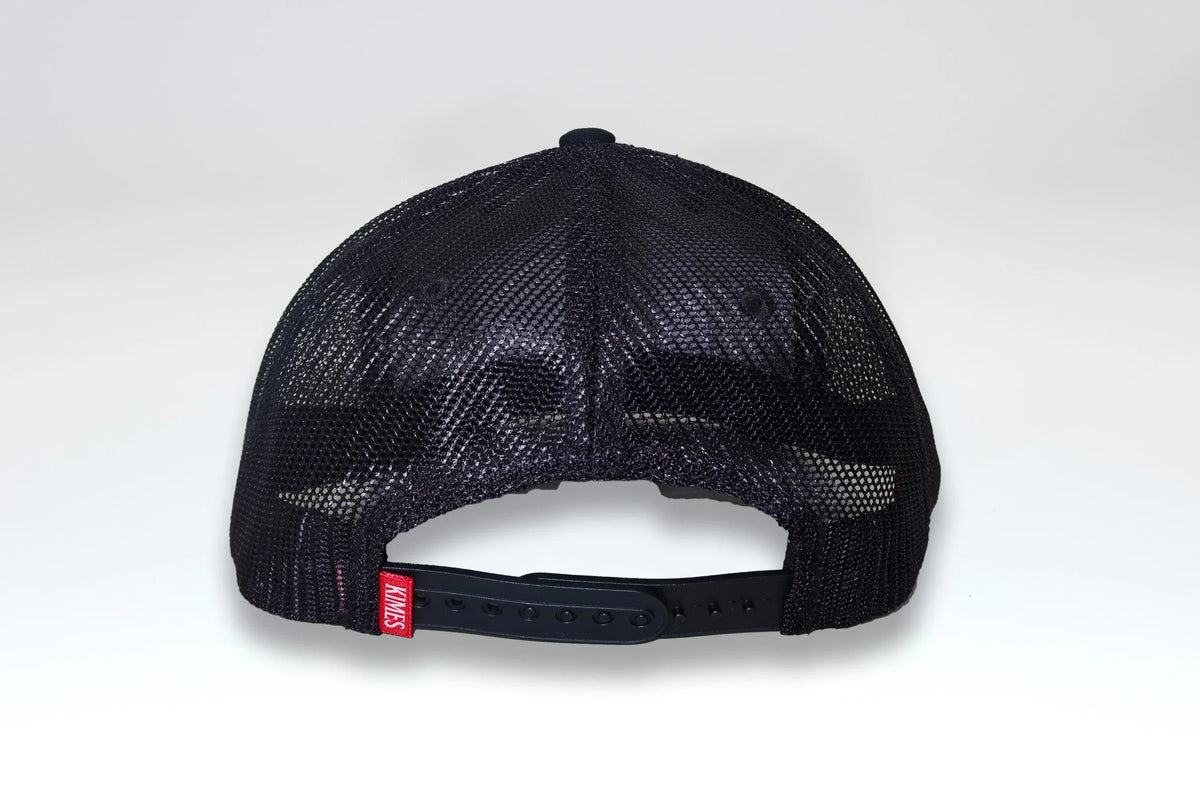 Kimes Ranch All Mesh Trucker Hat in Black, back view, with adjustable snapback closure and red Kimes Ranch logo tag