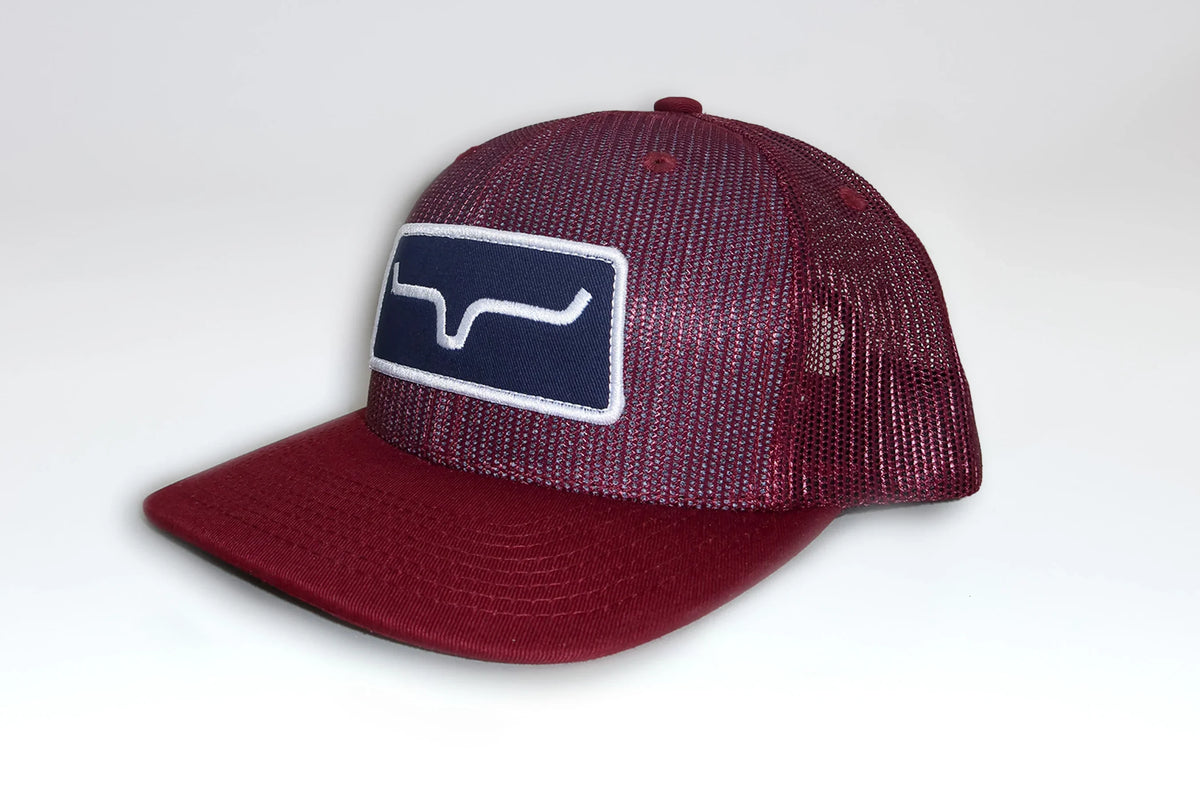Kimes Ranch All Mesh Trucker Hat in Burgundy, side view, with a navy embroidered logo patch on the front
