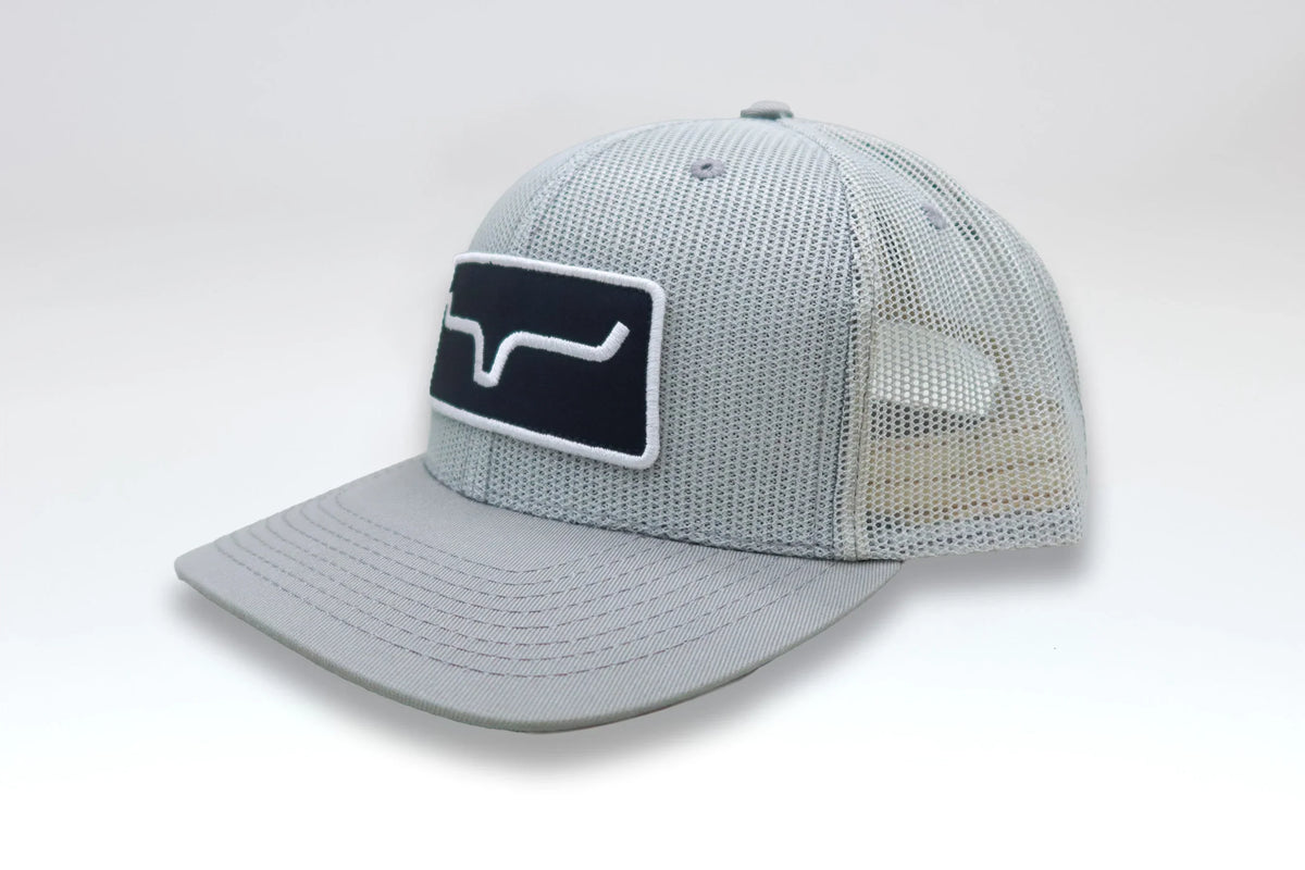 Kimes Ranch All Mesh Trucker Hat in Silver, side view, with a front logo patch