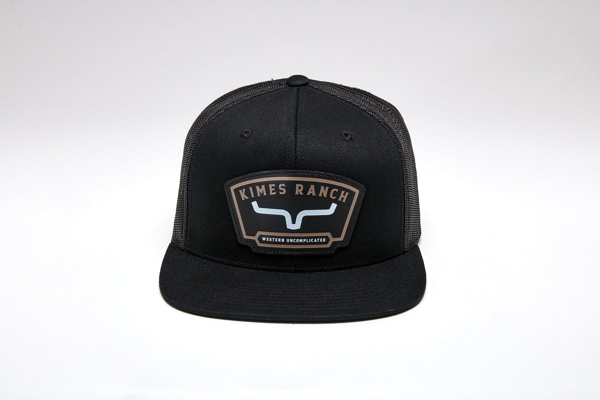 Kimes Ranch Amboy Black trucker hat with a front patch featuring the Kimes Ranch logo and Western Uncomplicated text