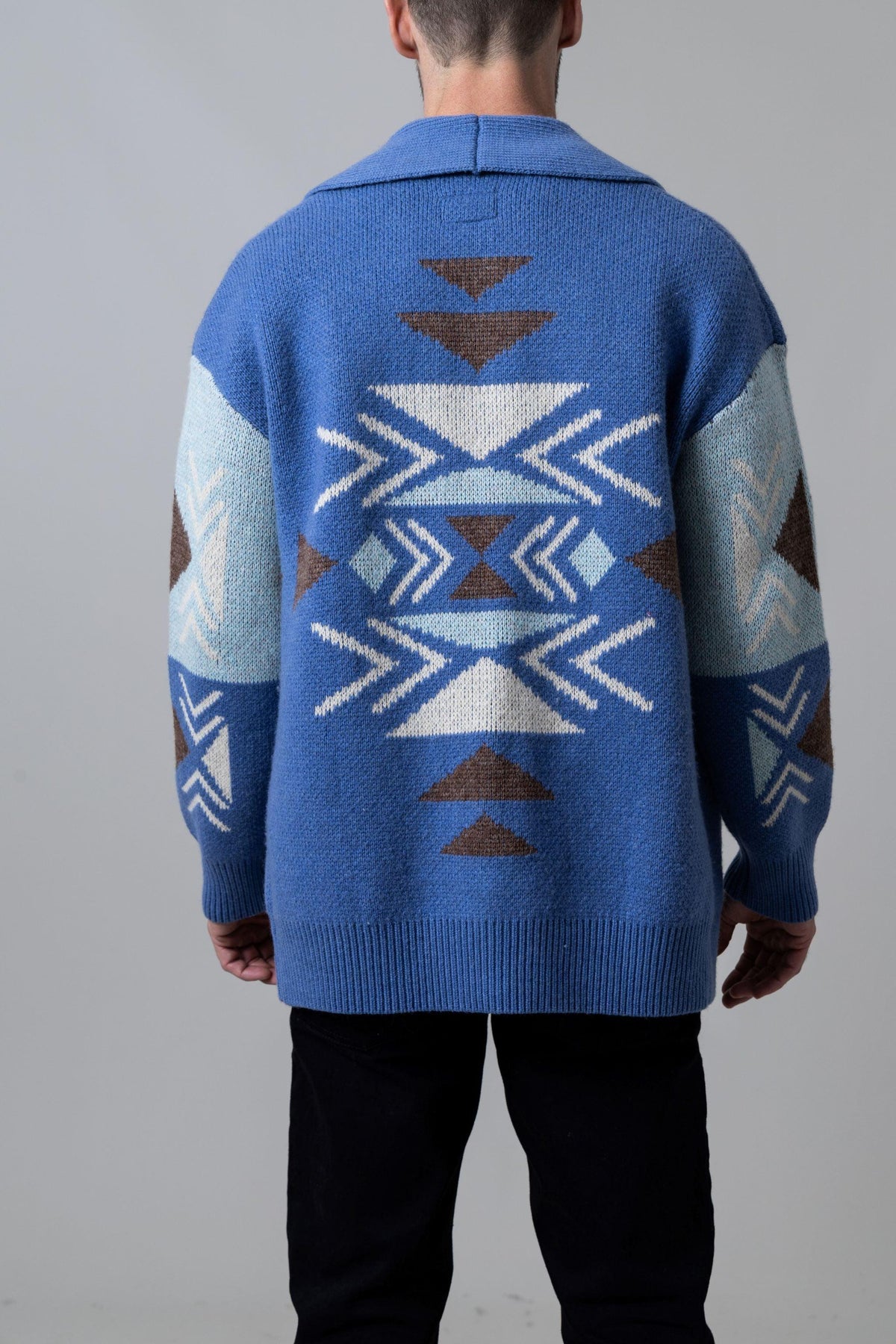 Kimes Ranch Artesia Cardigan in Slate Blue, back view, with a geometric pattern on the back and sleeves