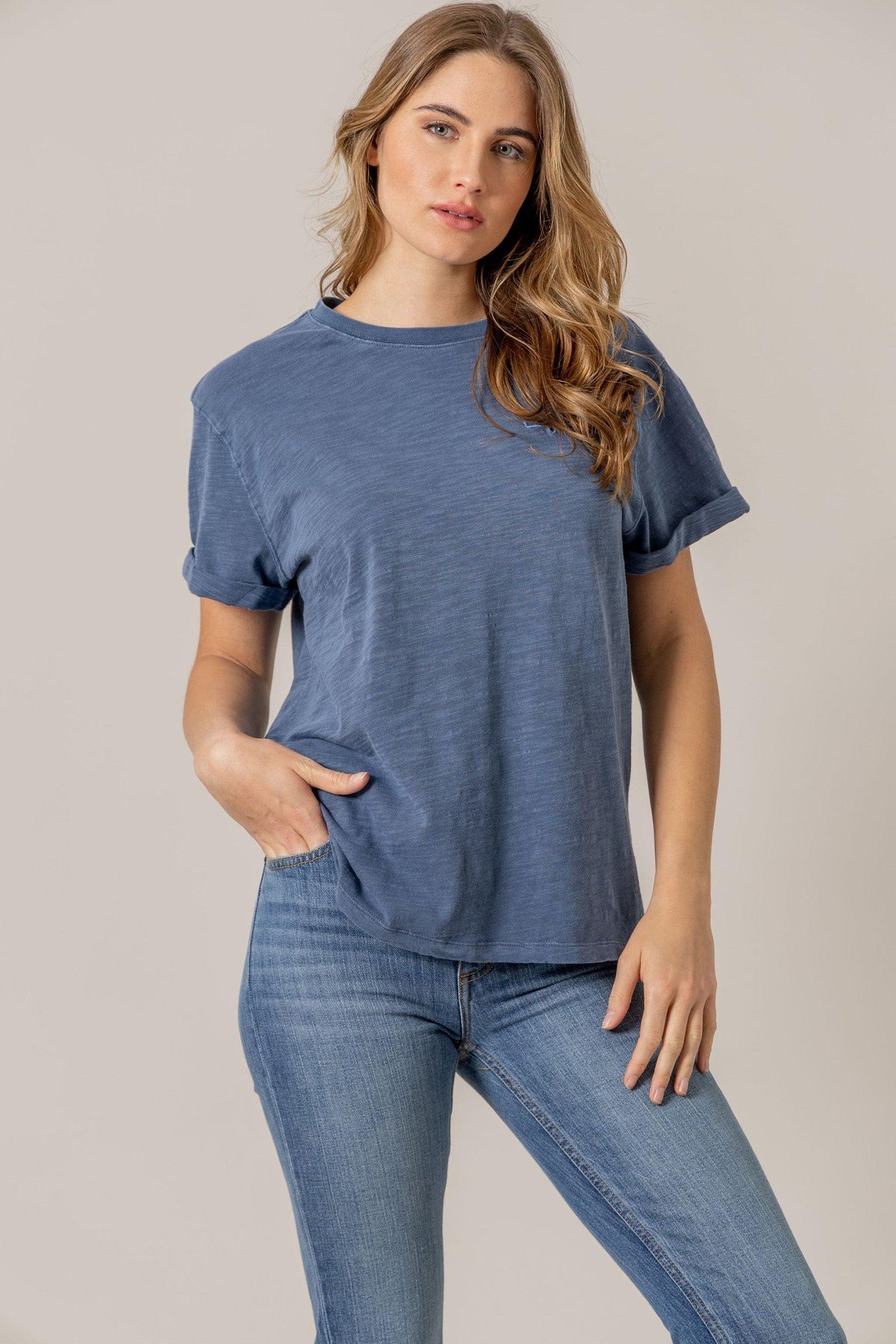 Kimes Ranch Ashley Tee in Blue with rolled short sleeves and a crew neck