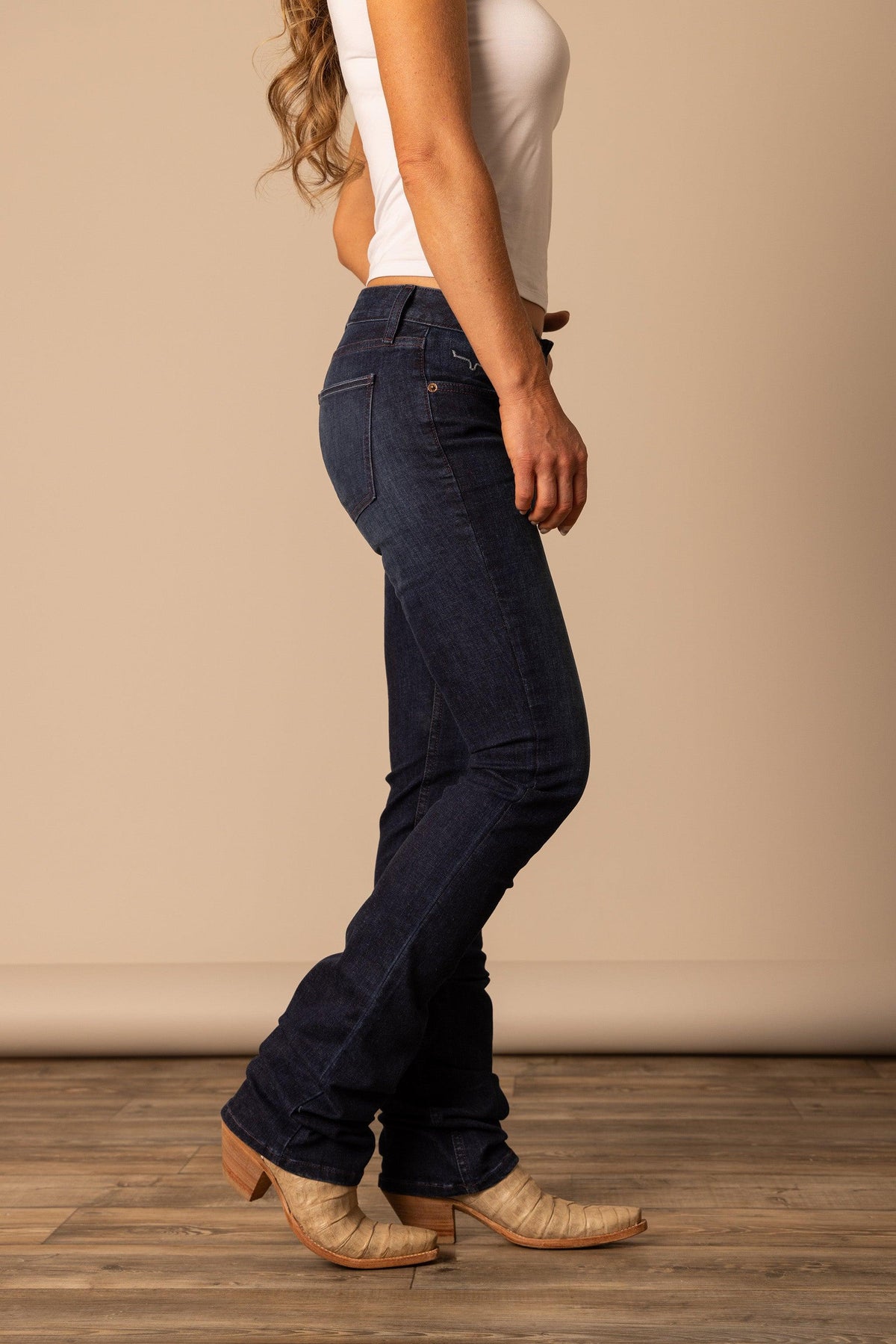 Kimes Ranch Audrey jeans in Dark Wash, side view, with the fit and back pocket detail