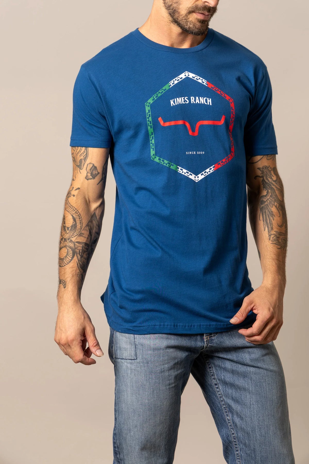 Kimes Ranch Baja Diamond shirt in Cool Blue with a hexagon graphic and Kimes Ranch logo