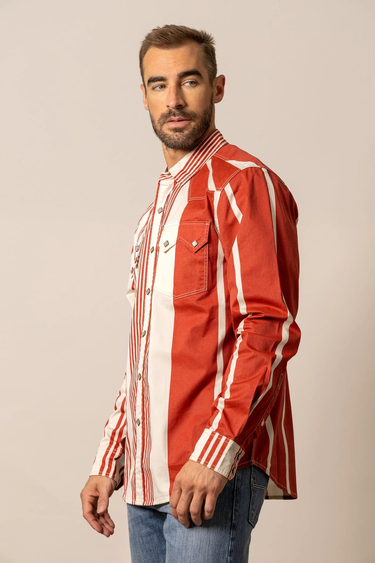 Kimes Ranch Bandit dress shirt in Brick Red, side view, with white vertical stripes and a chest pocket