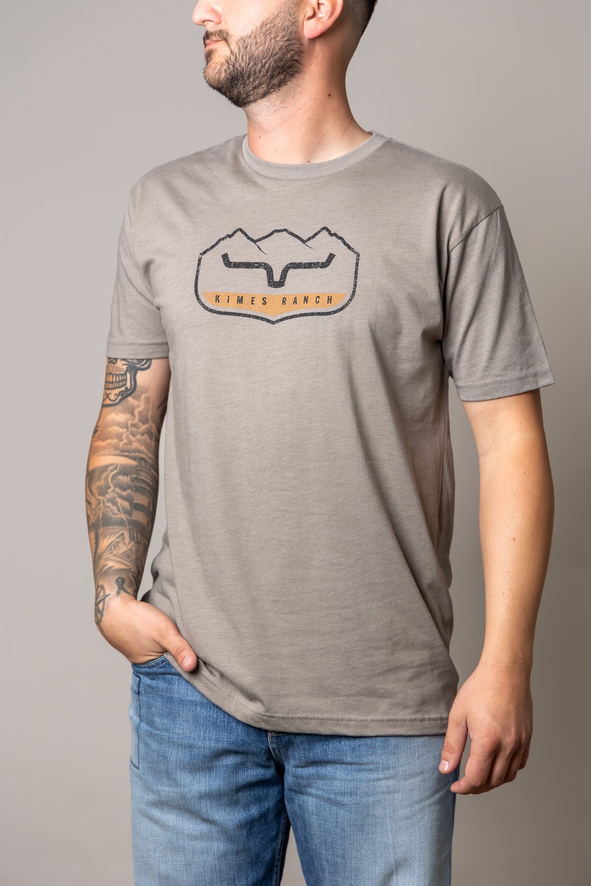 Kimes Ranch Banquet shirt in Stone with a front chest graphic featuring the Kimes Ranch logo