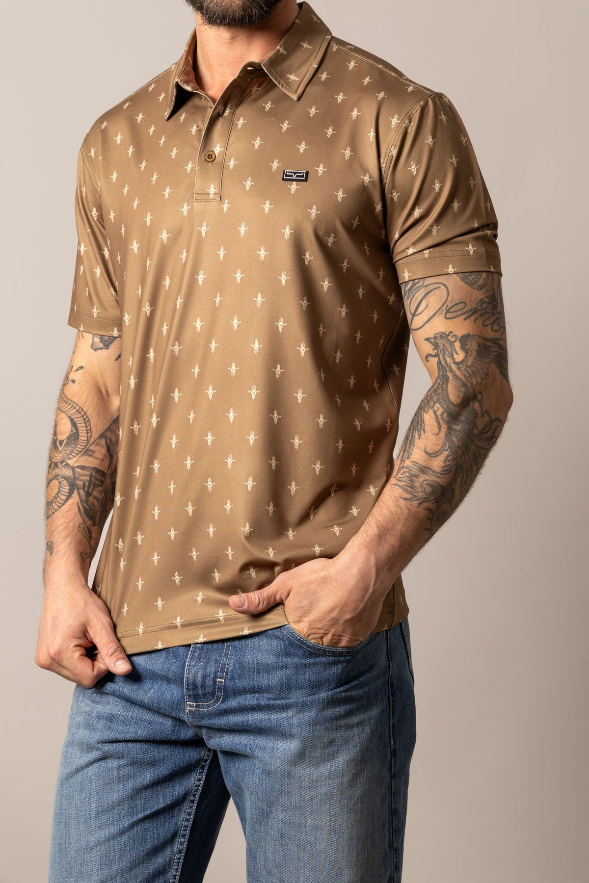 Kimes Ranch Bartram polo in Brown with an all-over Kimes Ranch logo print and a logo patch on the chest
