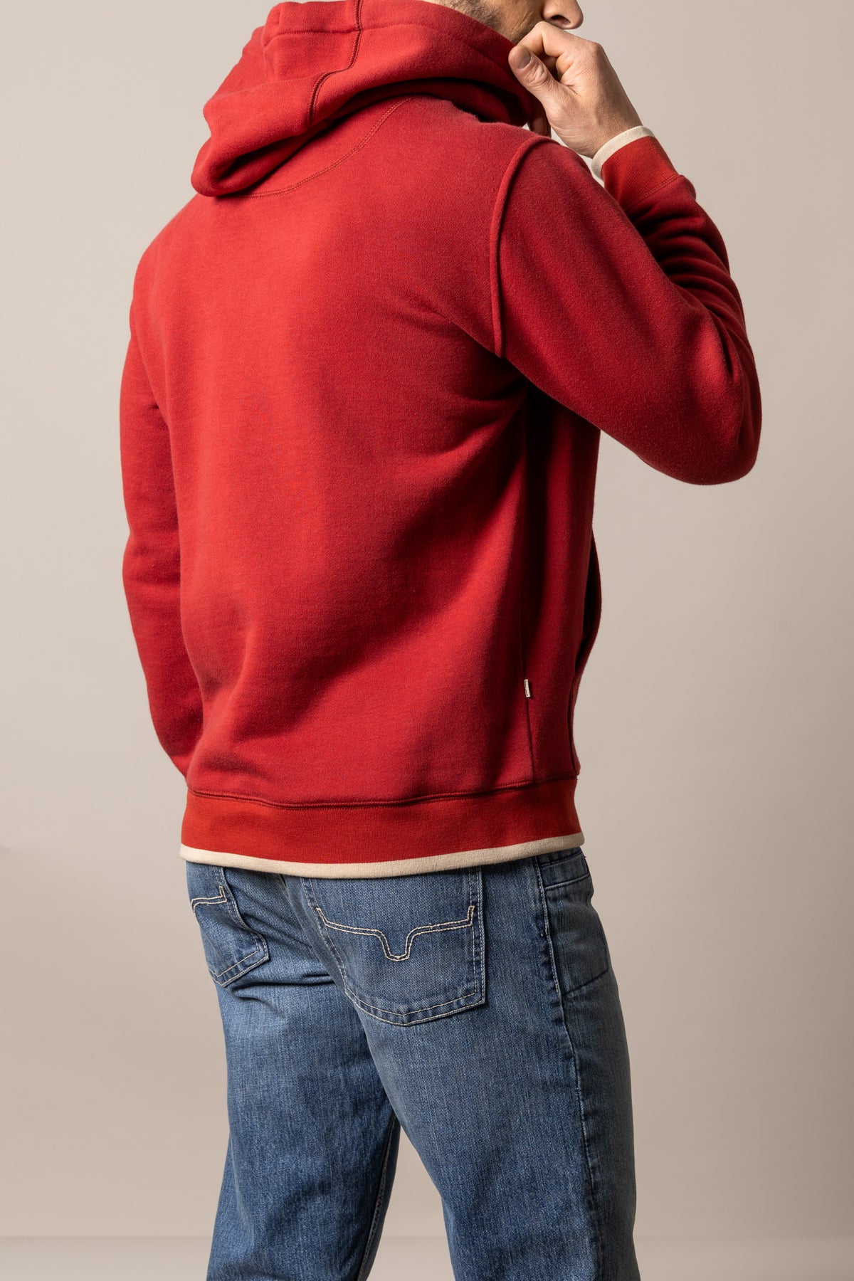 Kimes Ranch Berger hoodie in Brick Red, back view, with the hood and ribbed hem