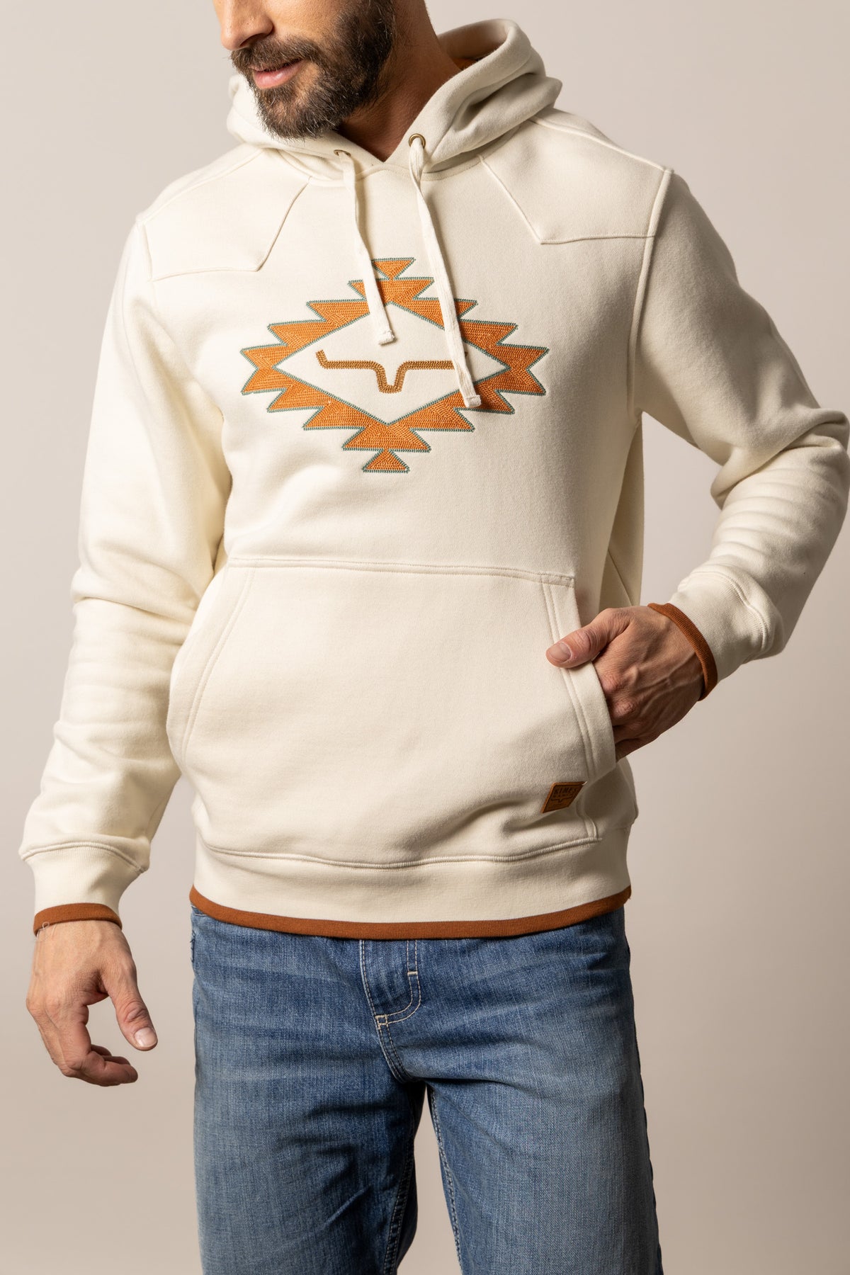 Kimes Ranch Berger hoodie in Natural with the Kimes Ranch logo and kangaroo pocket