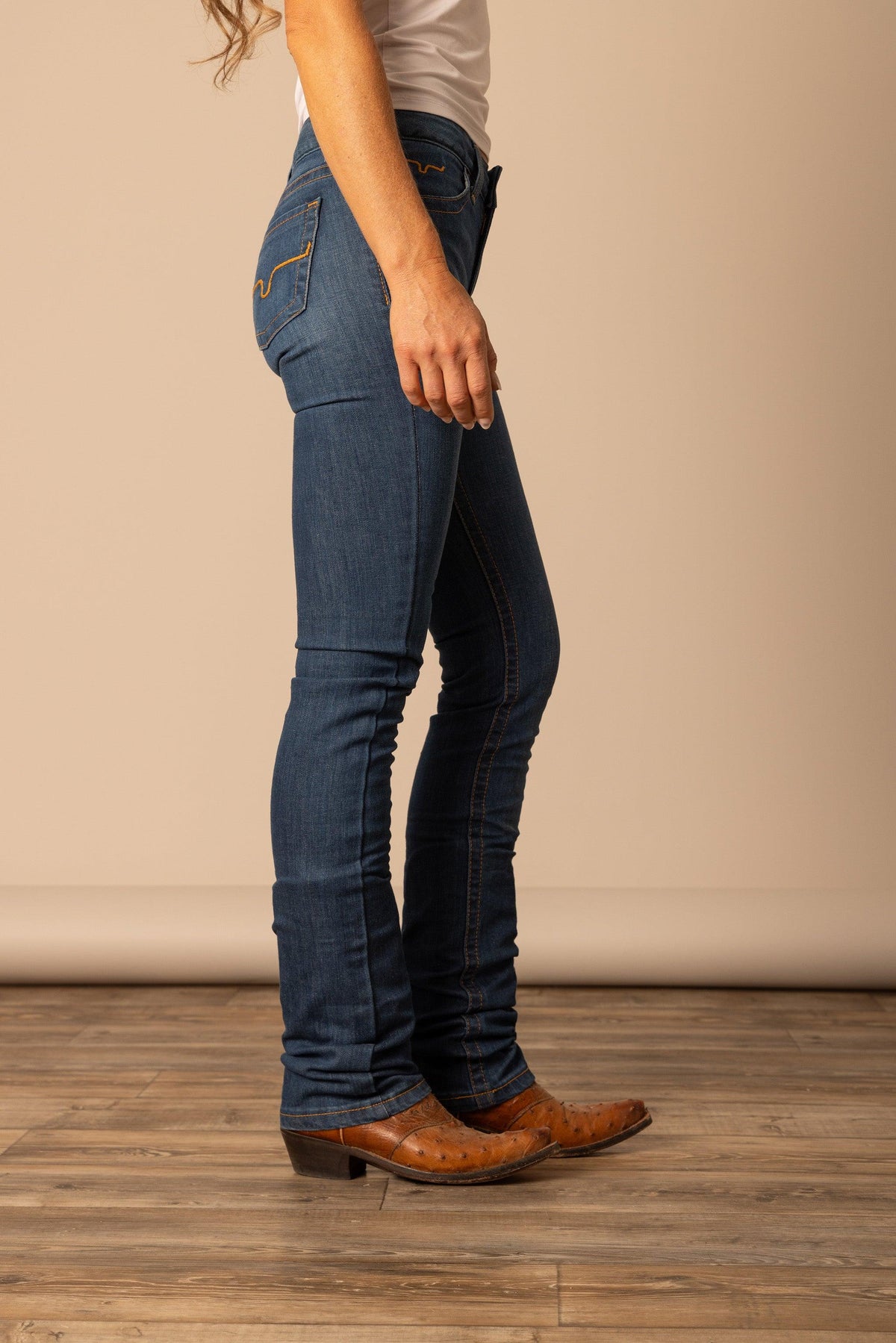 Kimes Ranch Betty17 jeans in Blue, side view, with the slim fit and back pocket stitching