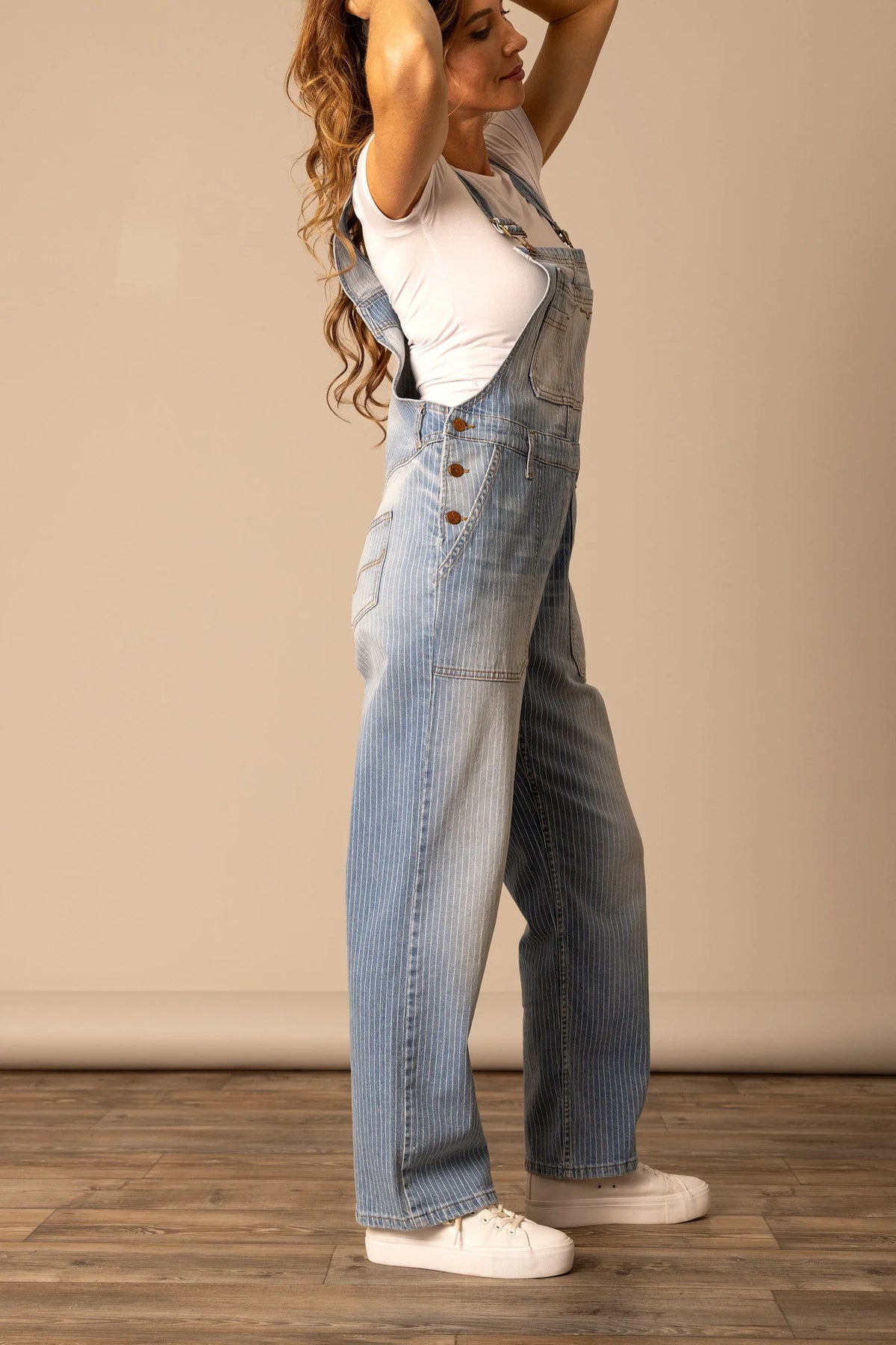 Kimes Ranch Billy Overalls, side view, in Stripe with button front and side pockets