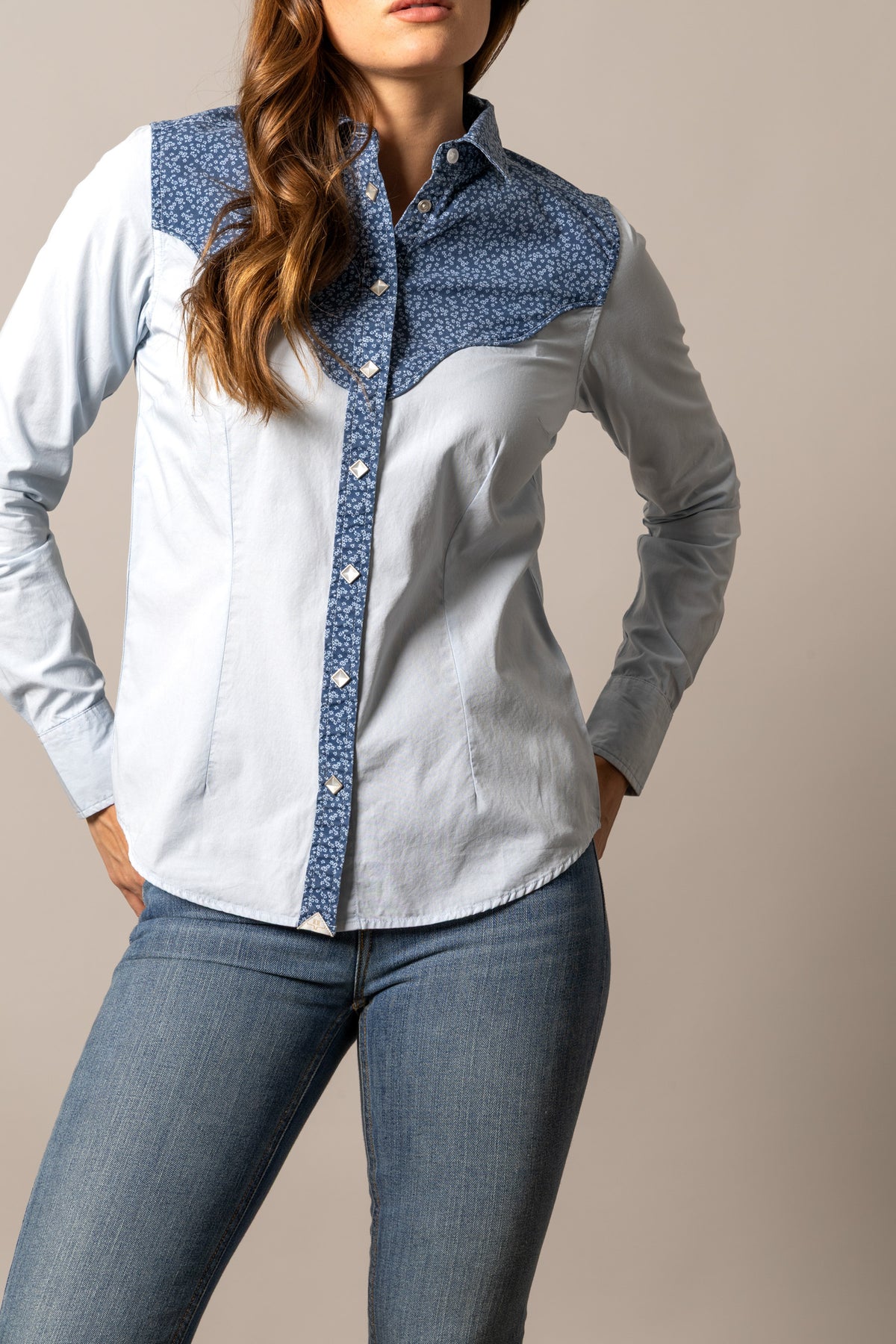 Kimes Ranch Birdie top in Light Blue with a blue floral yoke and front placket and silver snap buttons