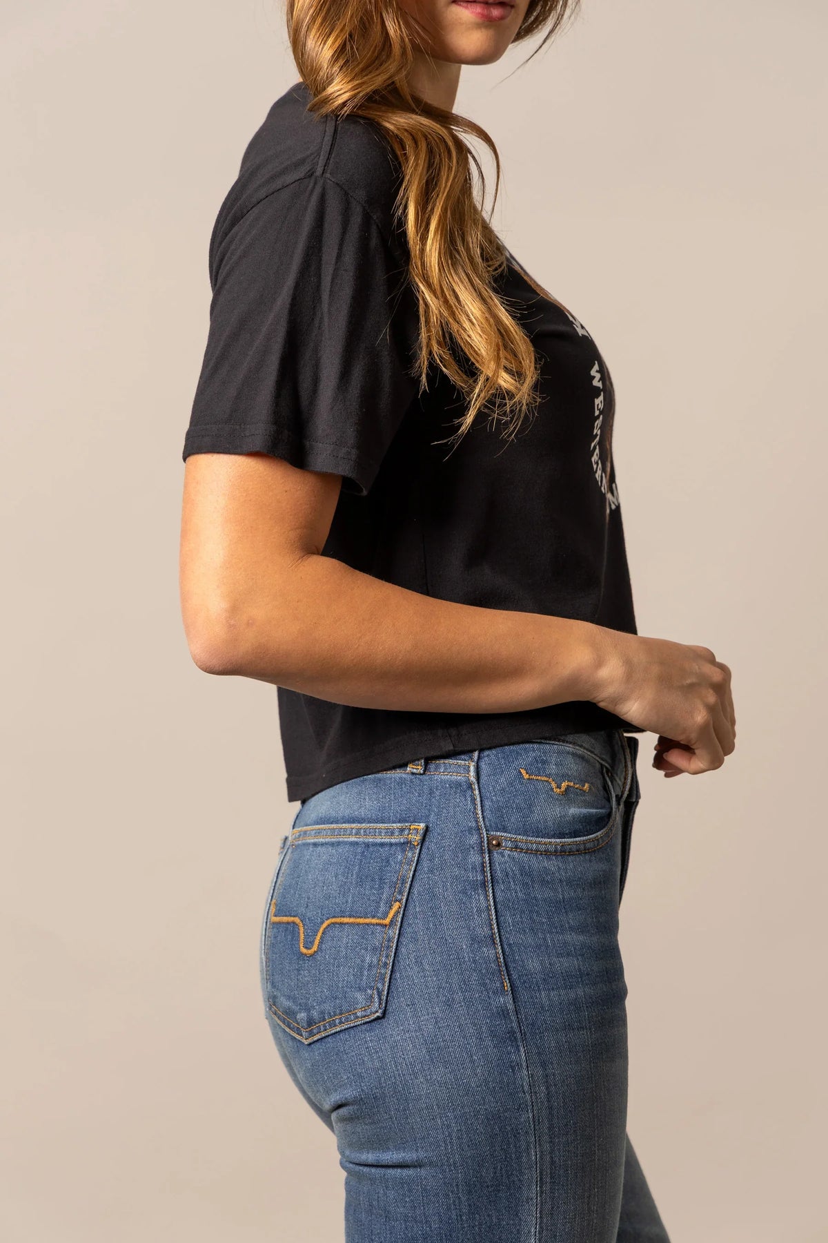 Kimes Ranch Bison Skull shirt in Black, side view, with short sleeves and curved hem