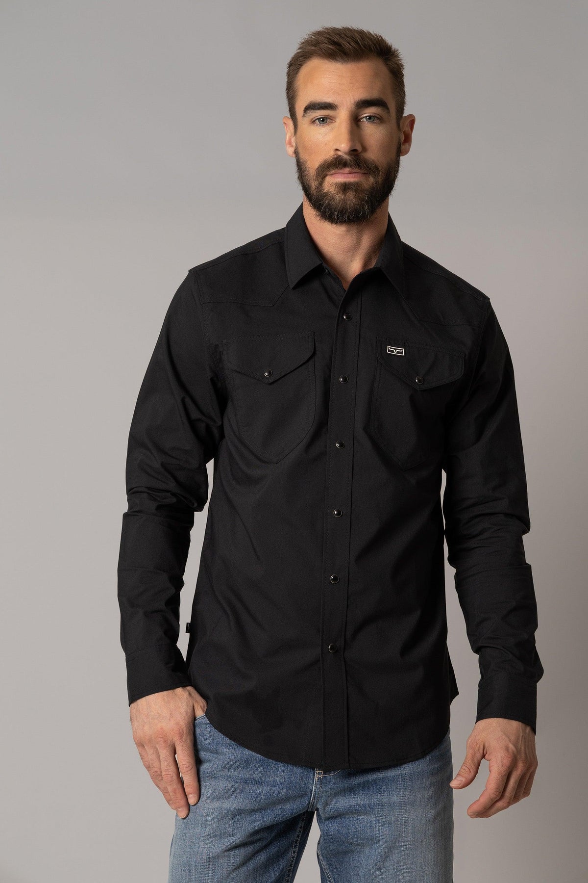 Kimes Ranch Blackout Dress Shirt in Black with a western yoke and two chest pockets with button flaps