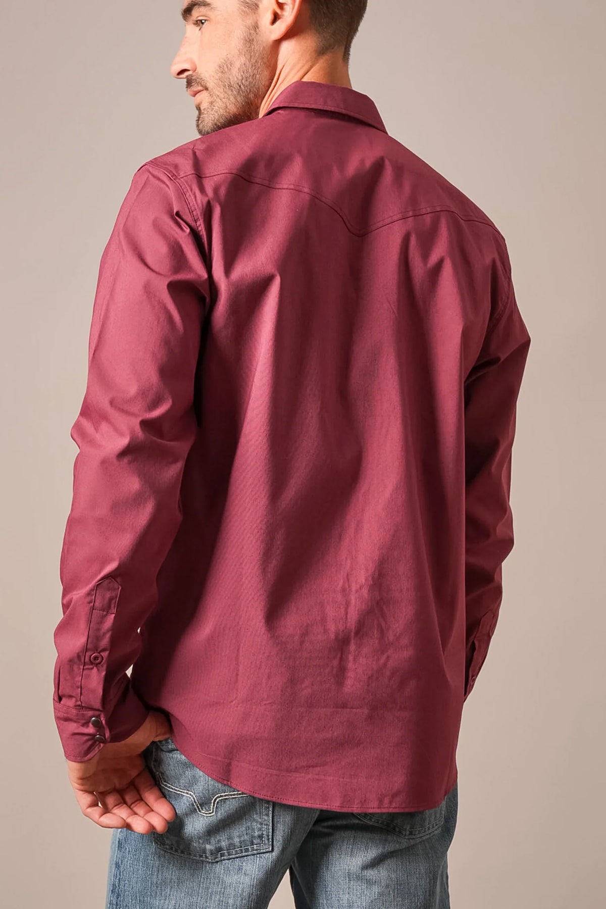 Kimes Ranch Blackout Dress Shirt in Burgundy, back view, with a back yoke and buttoned cuffs