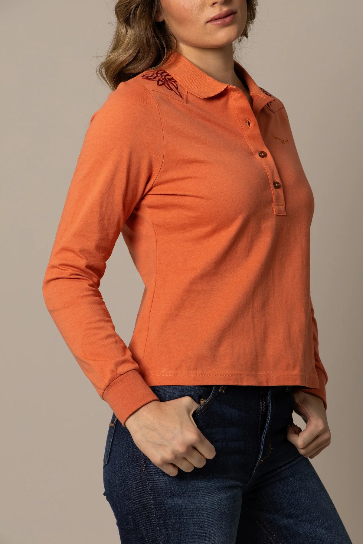 Kimes Ranch Bluebell long sleeve polo in Muted Red, side view, with embroidered yoke and logo