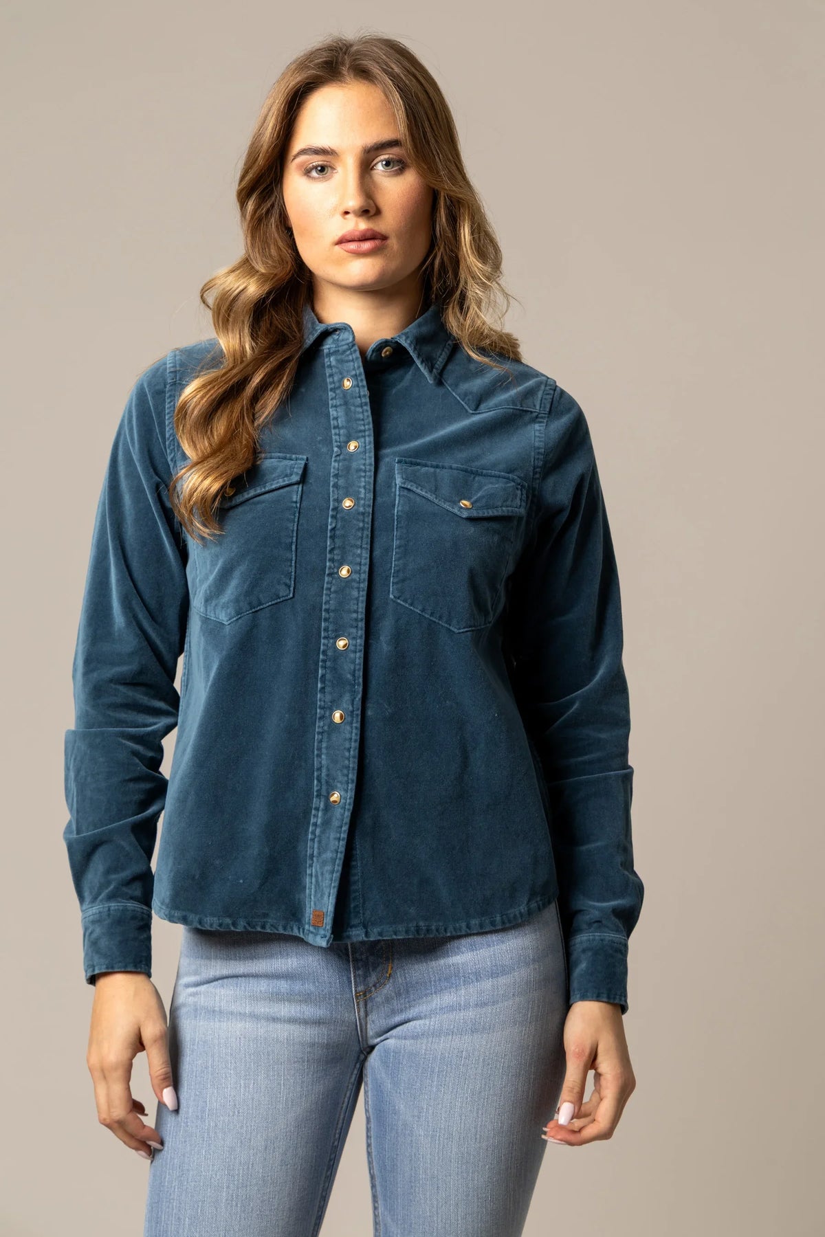 Kimes Ranch Bonnie top in Mid Blue with a button front and two chest pockets