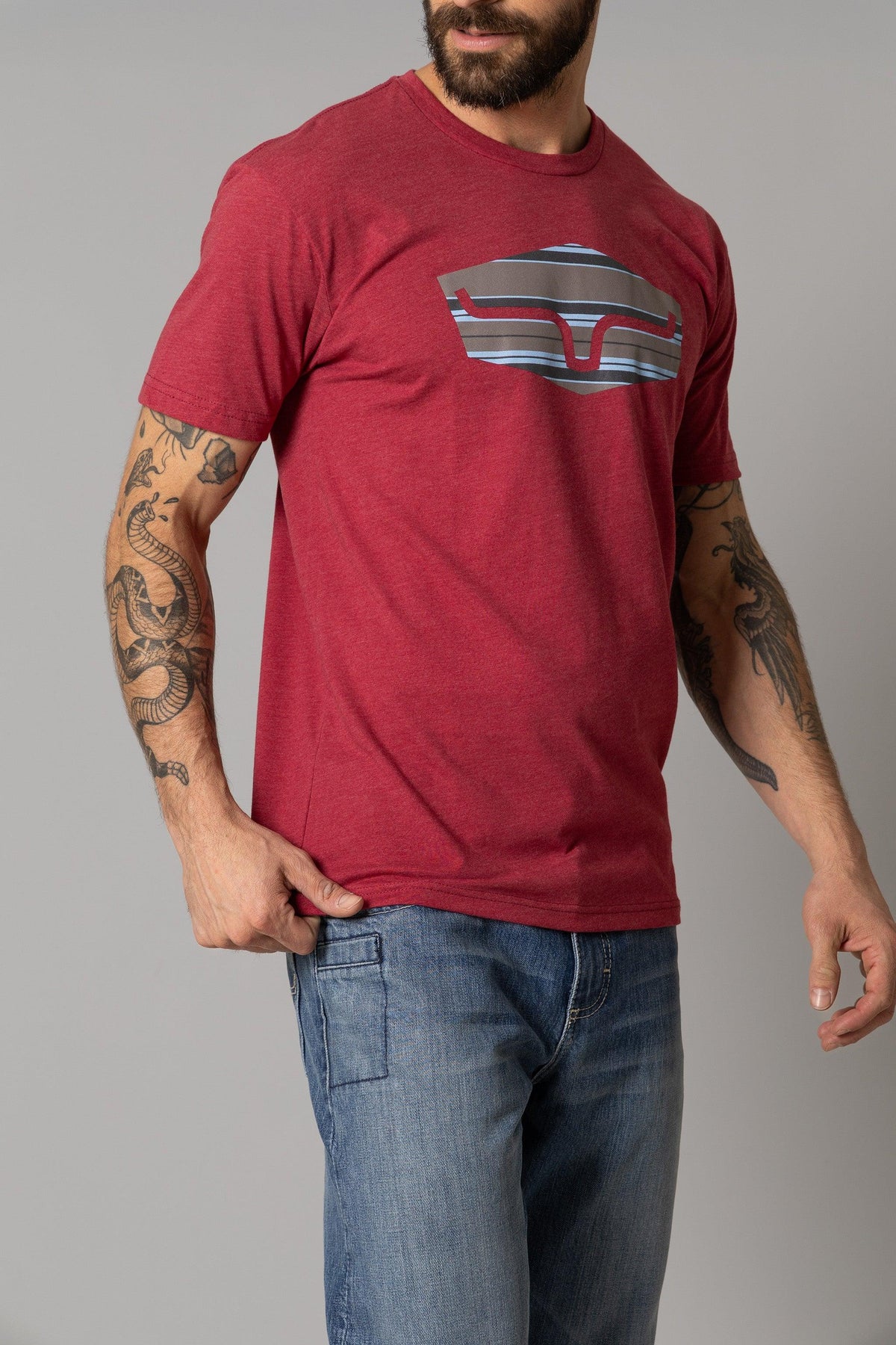 Kimes Ranch Box Seats Striped shirt in Cardinal with a graphic of a stadium seat with horizontal stripes
