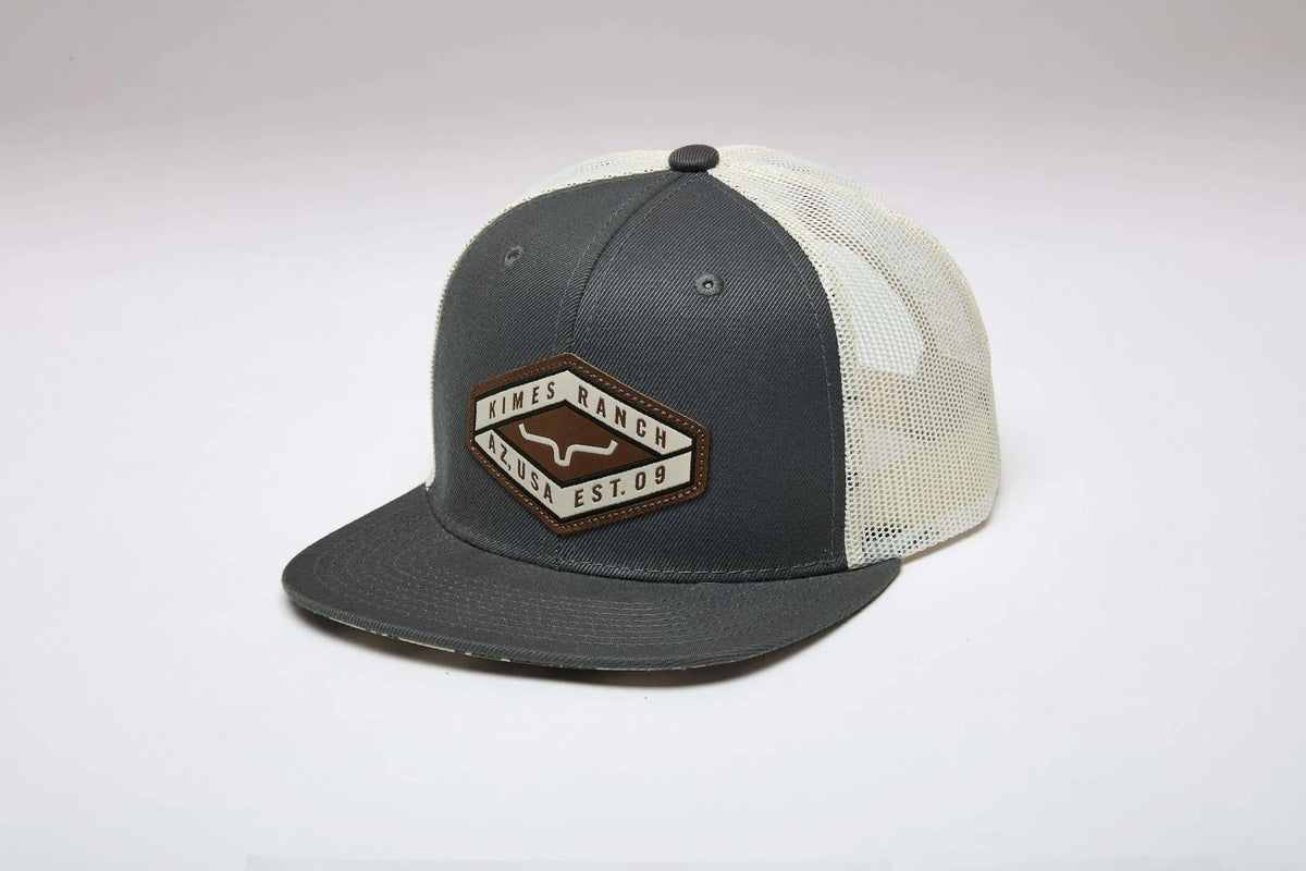 Kimes Ranch Boxer Trucker hat in Army Green, side view, with a front logo patch and mesh back