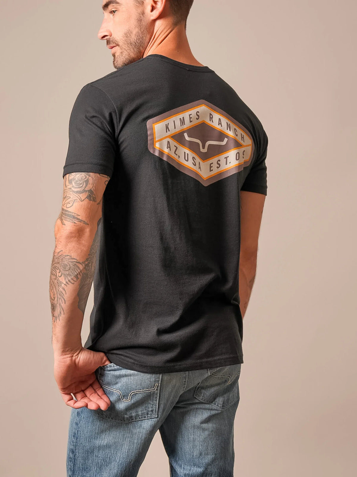 Kimes Ranch Boxer shirt in Black, back view, with a large back graphic featuring the Kimes Ranch logo and text AZ USA EST 09