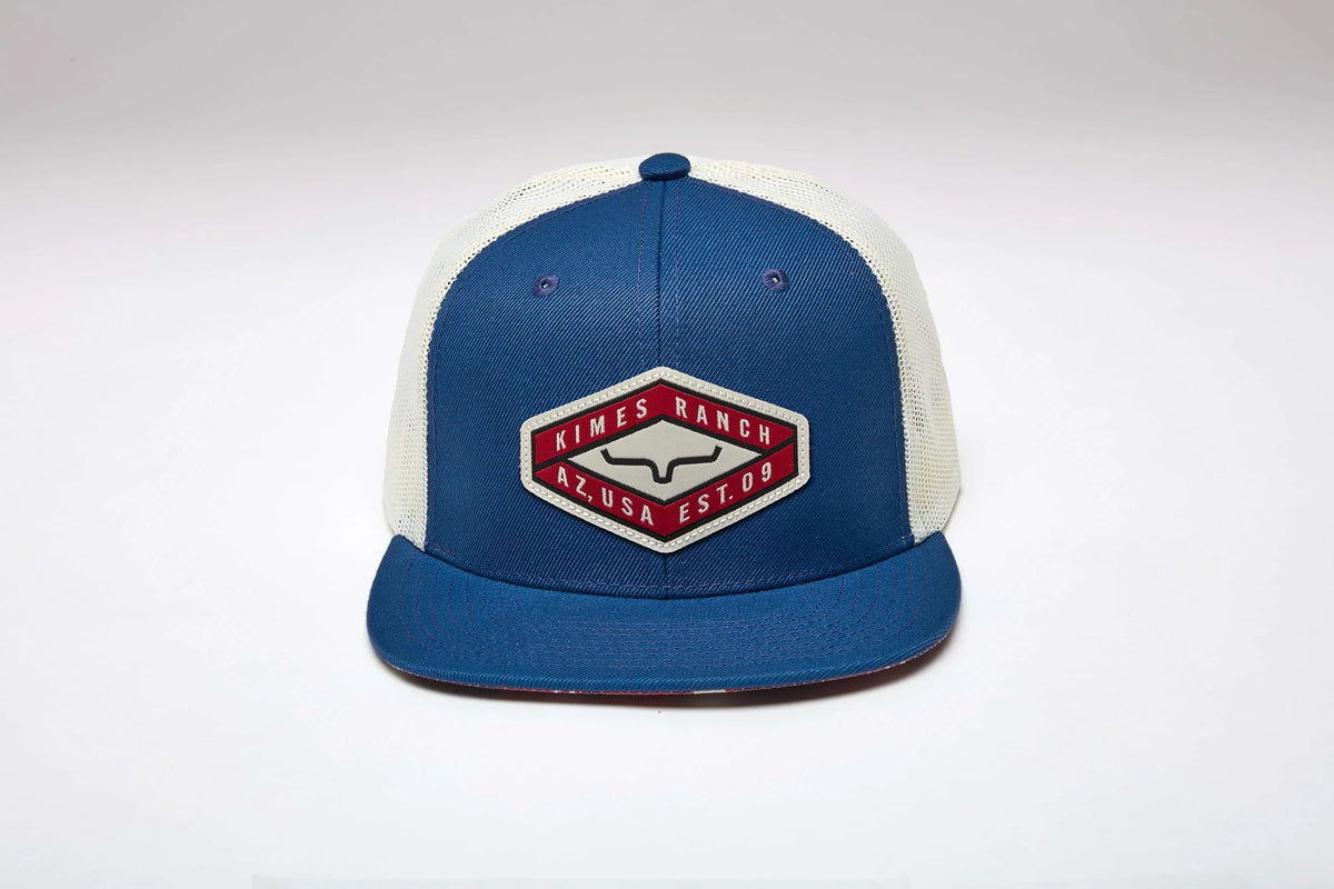 Kimes Ranch Boxer Trucker hat in Blue with a white mesh back and a front embroidered logo patch