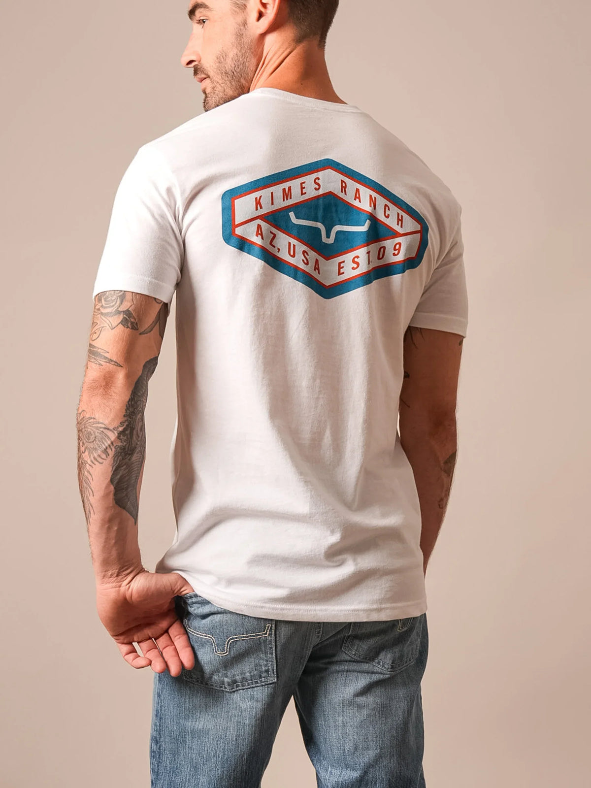 Kimes Ranch Boxer shirt in White, back view, with a large back graphic featuring the Kimes Ranch logo and AZ USA EST 09 text