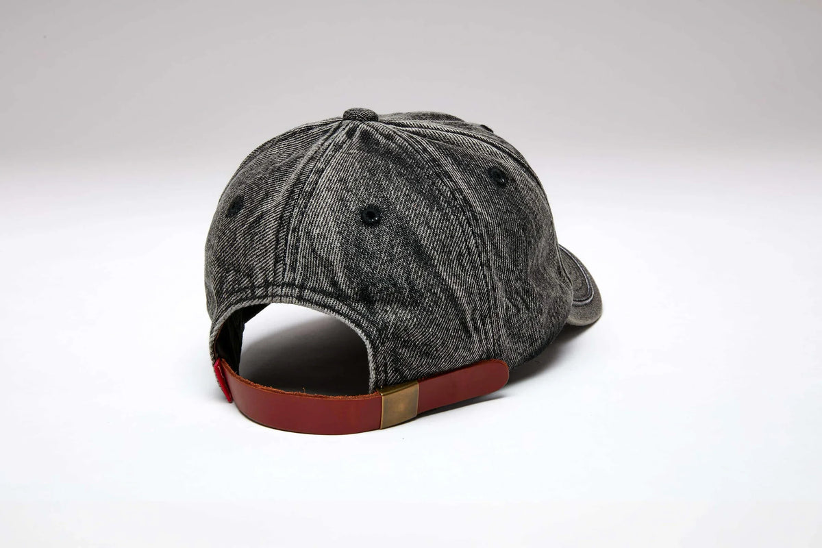 Kimes Ranch Branded KR hat in Black, back view, with a red back strap and brass buckle