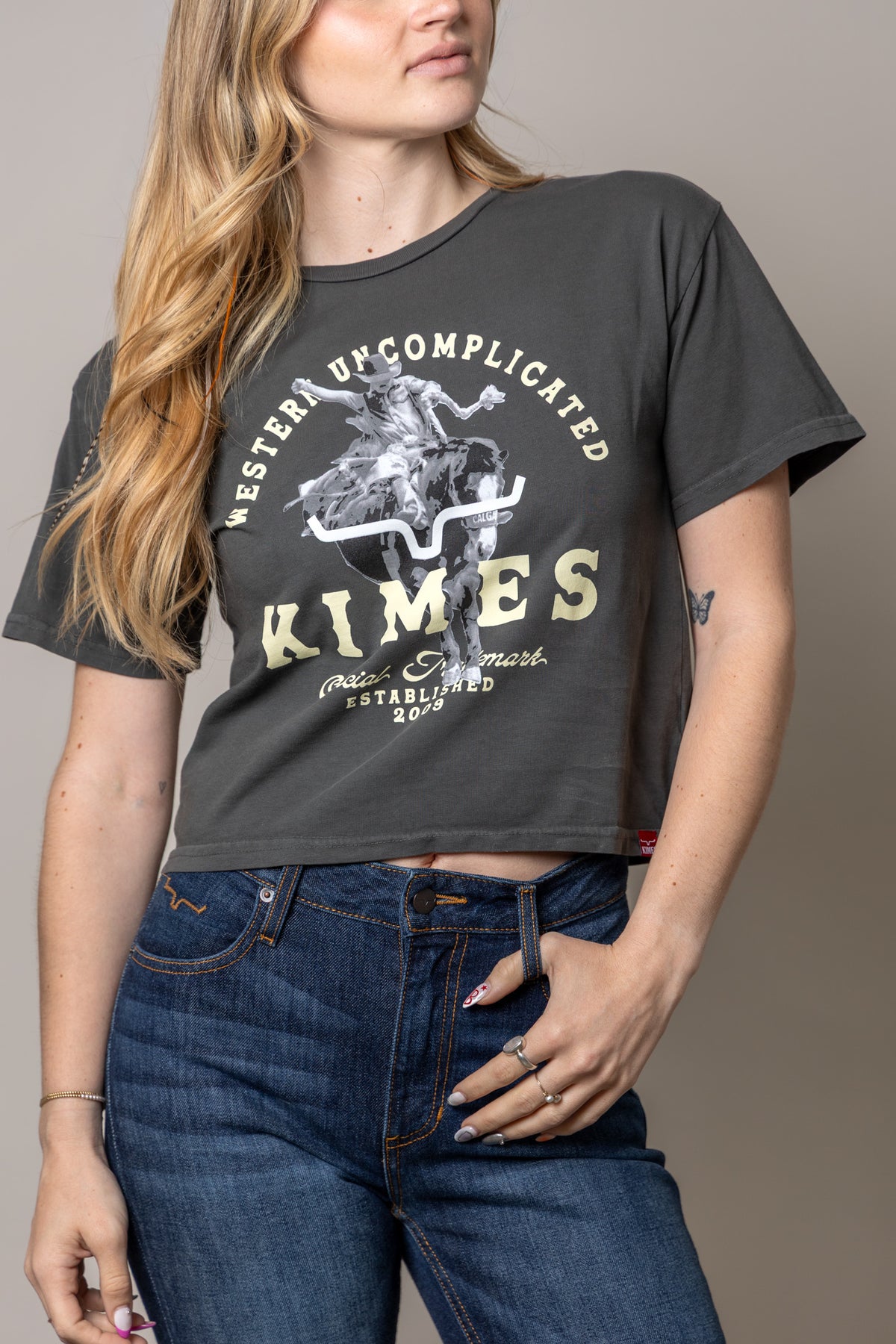 Kimes Ranch Break Through shirt in Pepper with a graphic of a cowboy riding a longhorn with Western Uncomplicated text