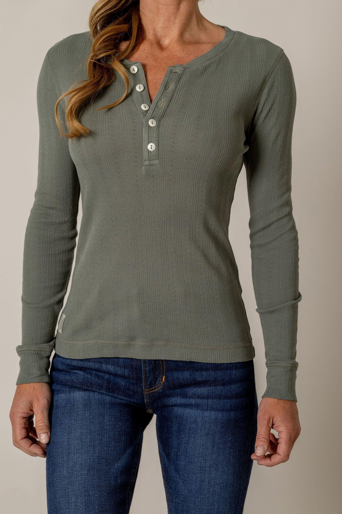 Kimes Ranch Bree Henley in Pine with long sleeves and a button placket