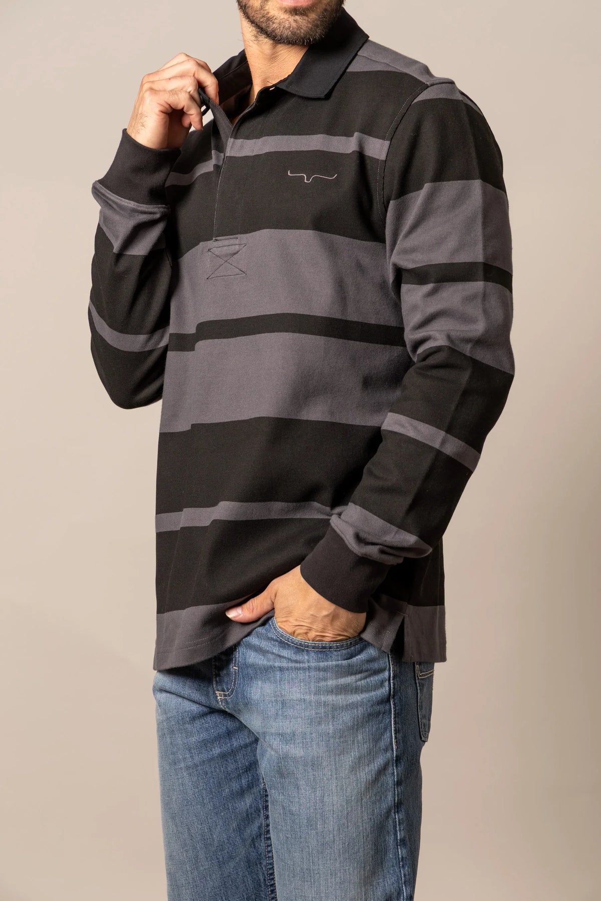 Kimes Ranch Bulldog Rugby polo in Black with grey horizontal stripes and a chest logo