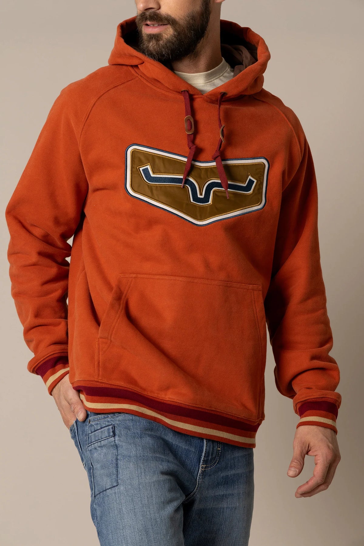 Kimes Ranch Cannons Hoodie in Brick Red with a large longhorn graphic on the chest and a kangaroo pocket