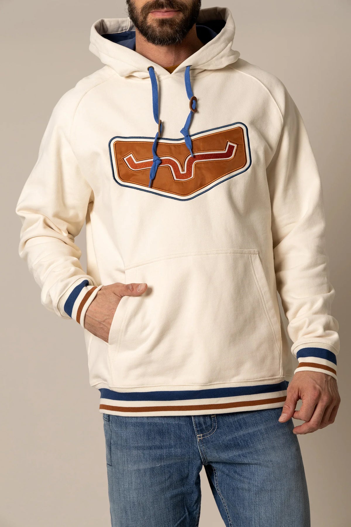 Kimes Ranch Cannons Hoodie in Natural with a large embroidered logo on the chest and striped cuffs