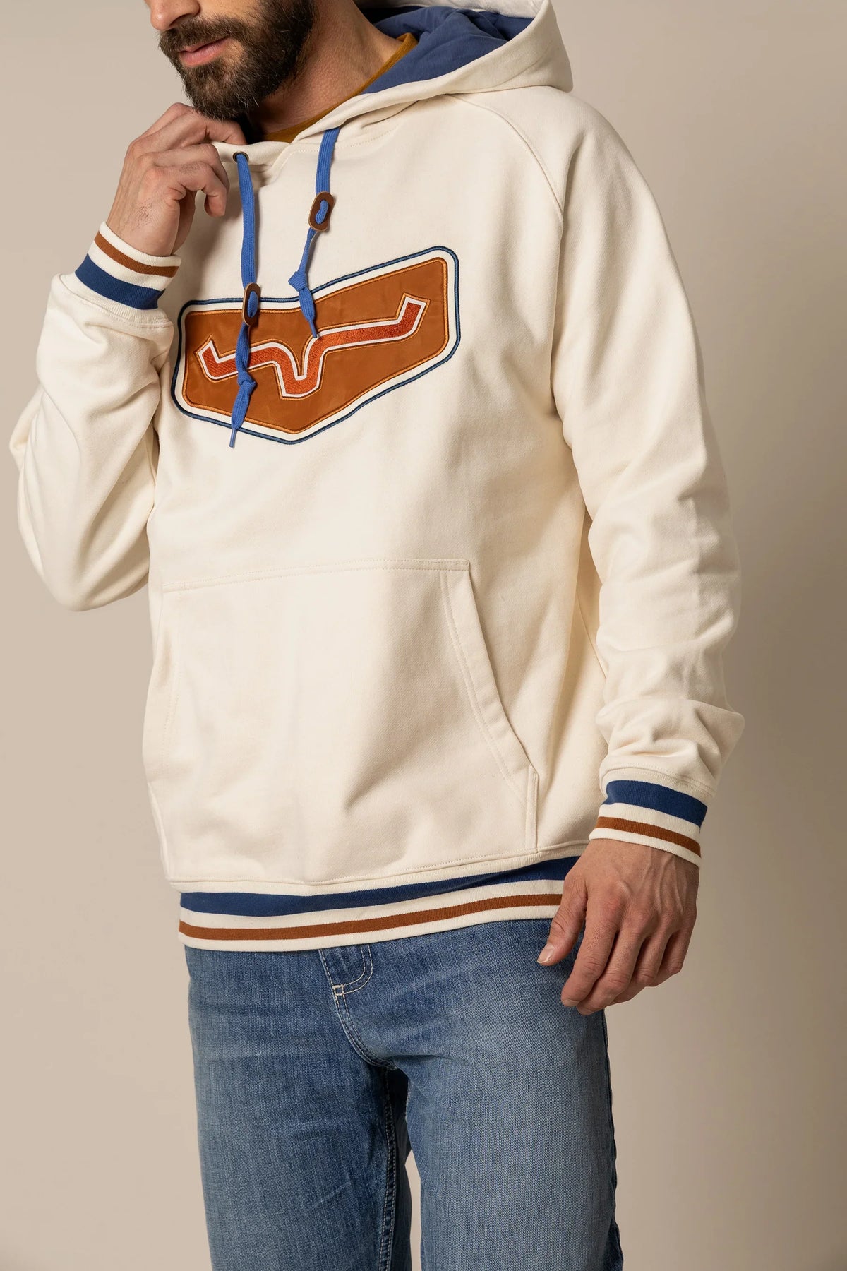 Kimes Ranch Cannons Hoodie in Natural with a large embroidered logo and striped cuffs