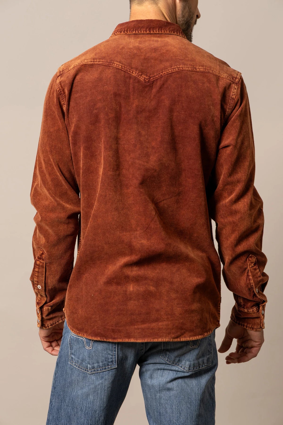 Kimes Ranch Catalina Cord dress shirt in Rust, back view, with a back yoke and button cuffs