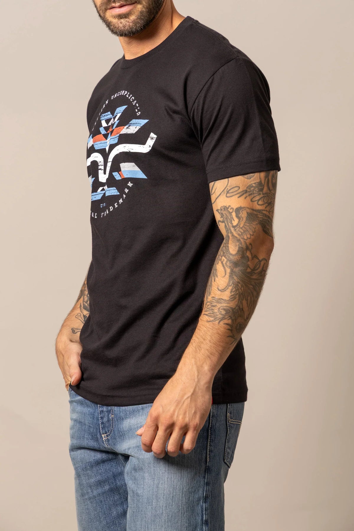 Kimes Ranch Circular Serape shirt in Black, side view, with a graphic print and short sleeves