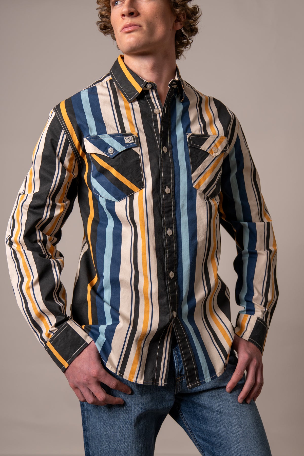Kimes Ranch Clancy dress shirt in Black with multi-color vertical stripes and two chest pockets
