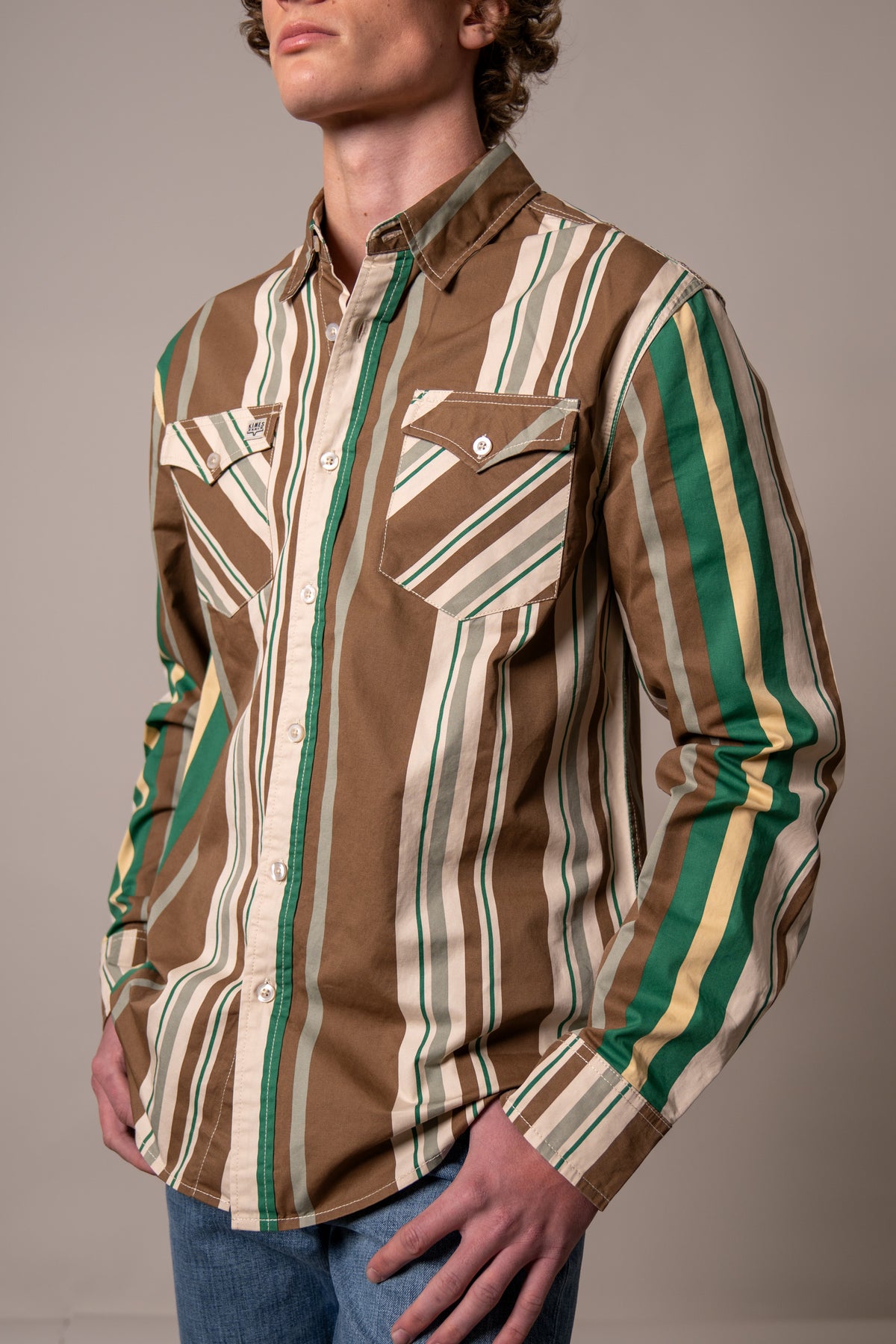 Kimes Ranch Clancy dress shirt in Brown with green and cream vertical stripes and two chest pockets