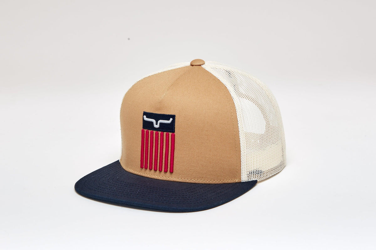 Kimes Ranch Cody Trucker hat in Work Wear Brown, side view, with navy brim and mesh back featuring a red and navy logo patch