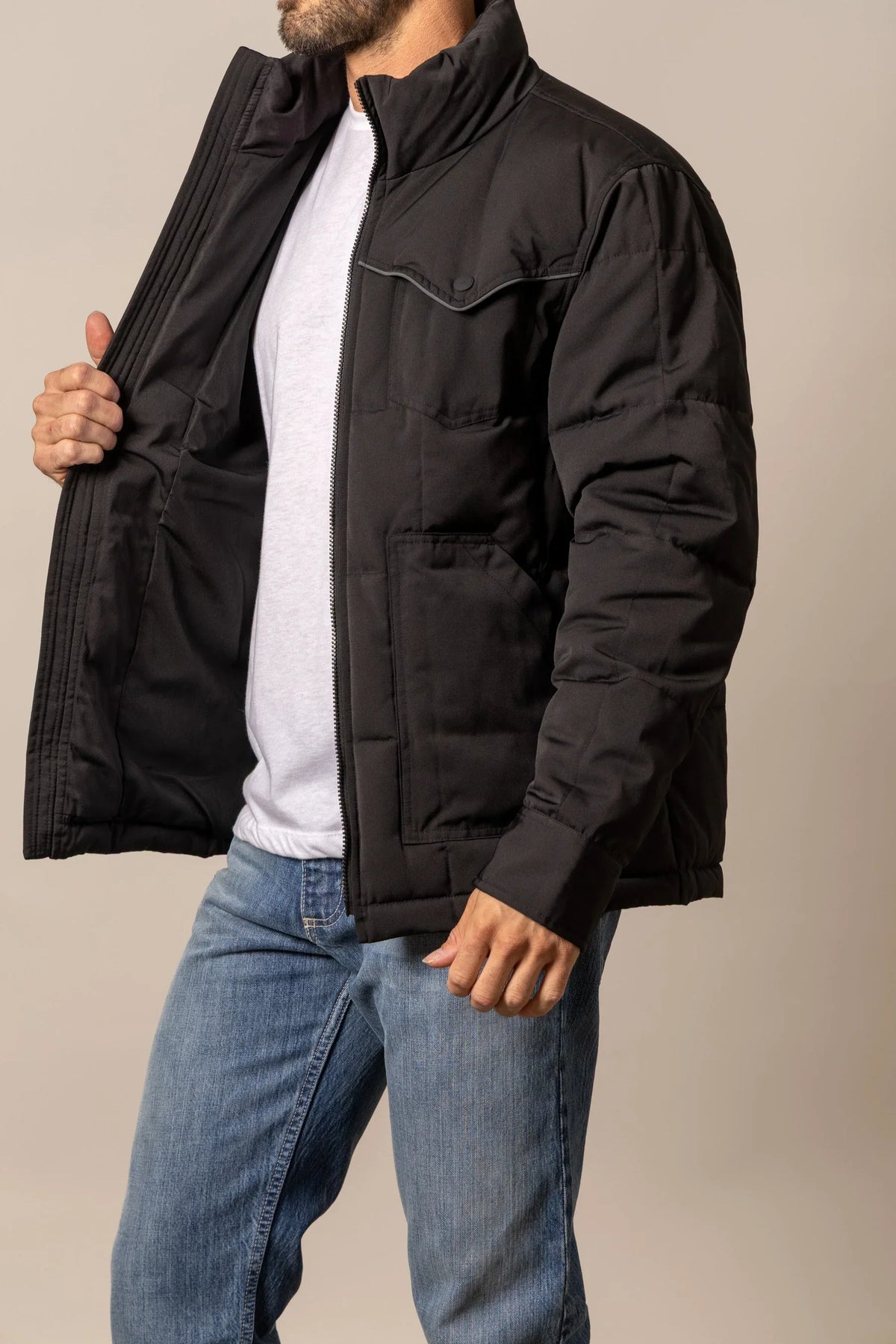 Kimes Ranch Colt Jacket in Black, side view, with a stand collar, zip front, and flap pockets