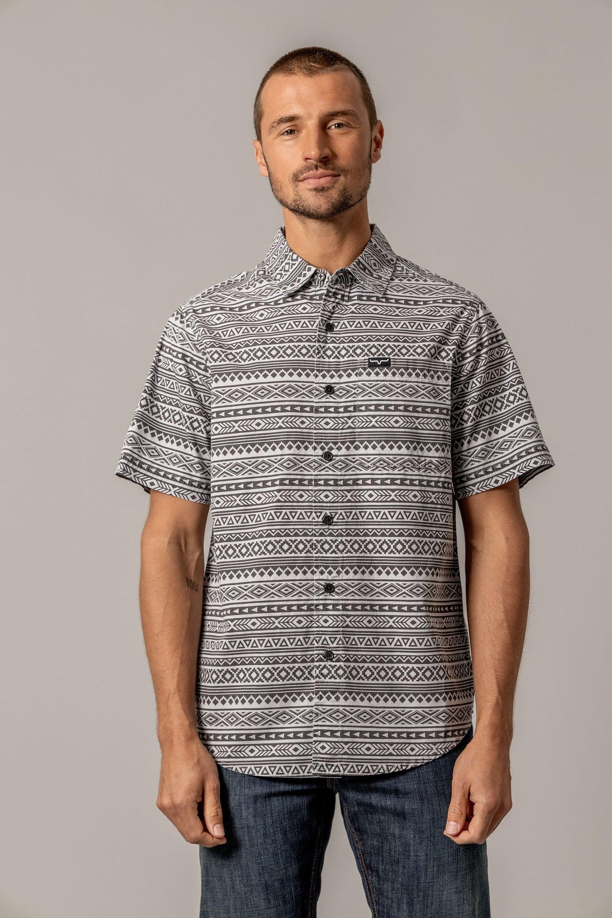 Kimes Ranch Colton short sleeve dress shirt in Grey with an all-over geometric pattern and a chest pocket